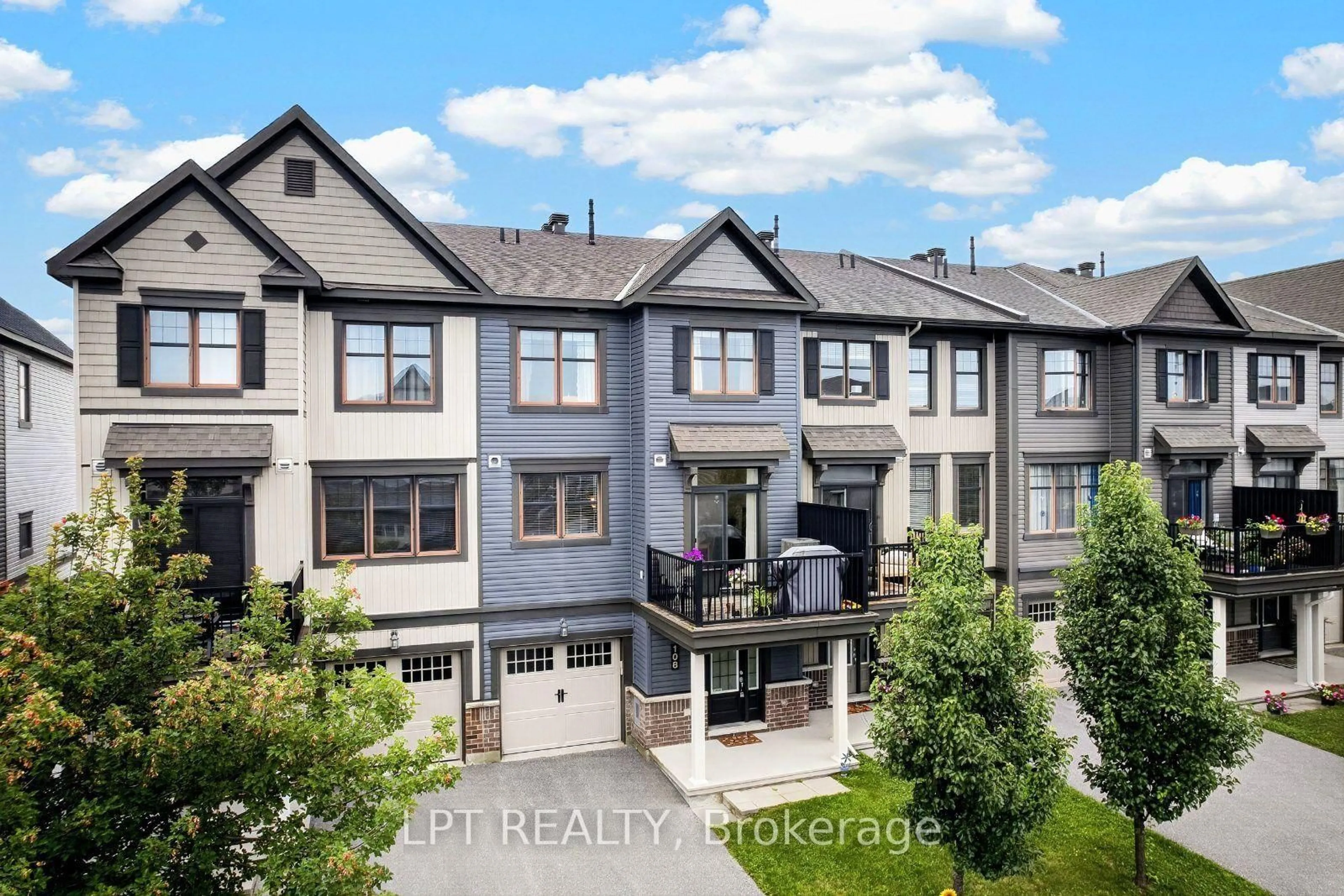 A pic from outside/outdoor area/front of a property/back of a property/a pic from drone, unknown for 108 Sweetwater Lane, Ottawa Ontario K2T 0L1
