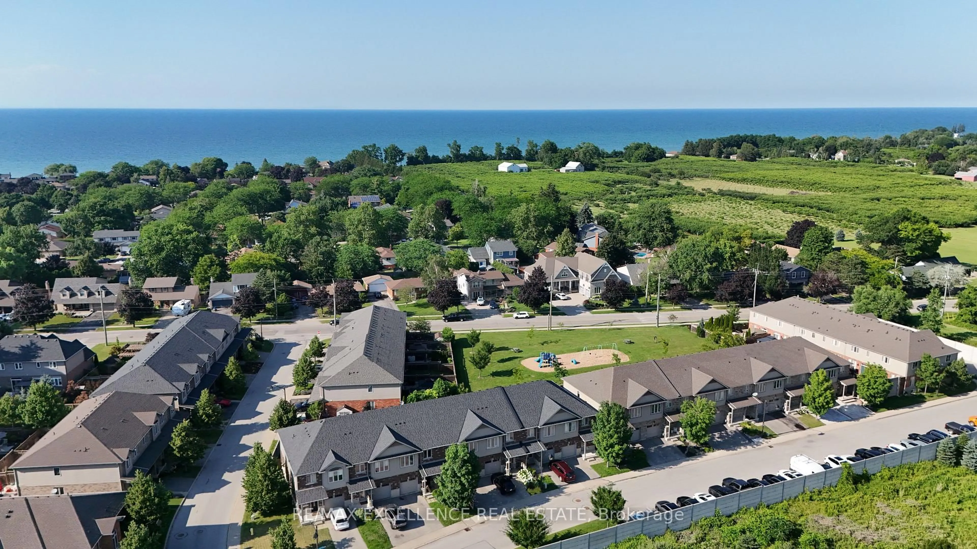 A pic from outside/outdoor area/front of a property/back of a property/a pic from drone, water/lake/river/ocean view for 380 Lake St #39, Grimsby Ontario L3M 0E8