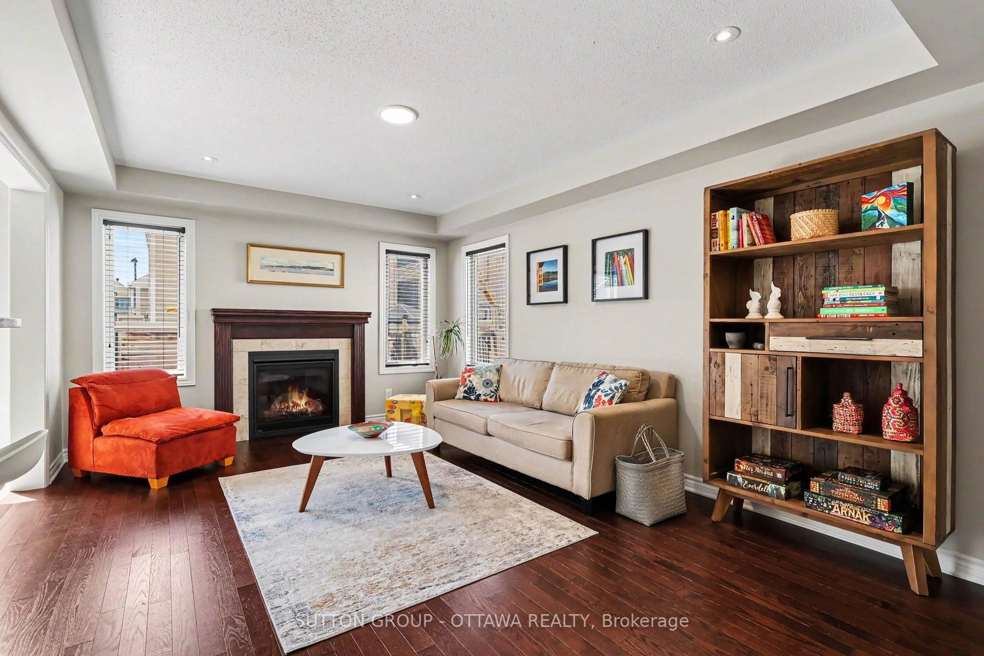 Living room with furniture, wood/laminate floor for 63 Astervale St, Ottawa Ontario K4A 1A5