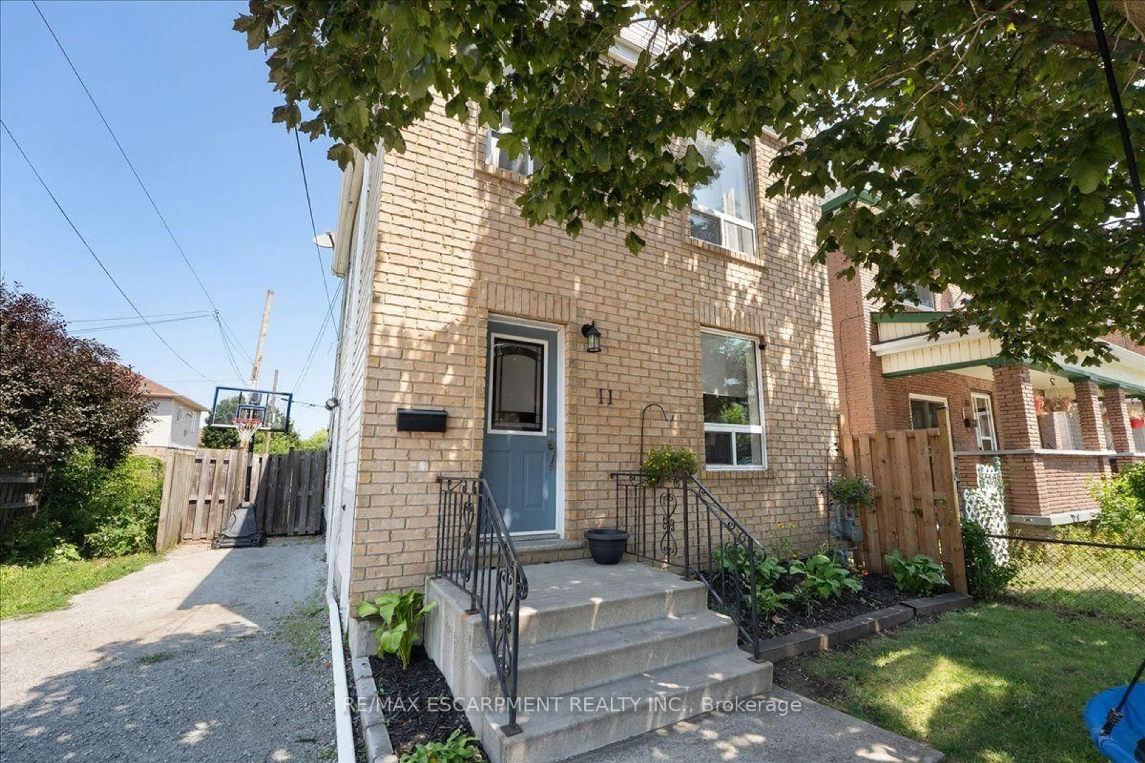 Home with brick exterior material, street for 11 PRIMROSE Ave, Hamilton Ontario L8L 2K7