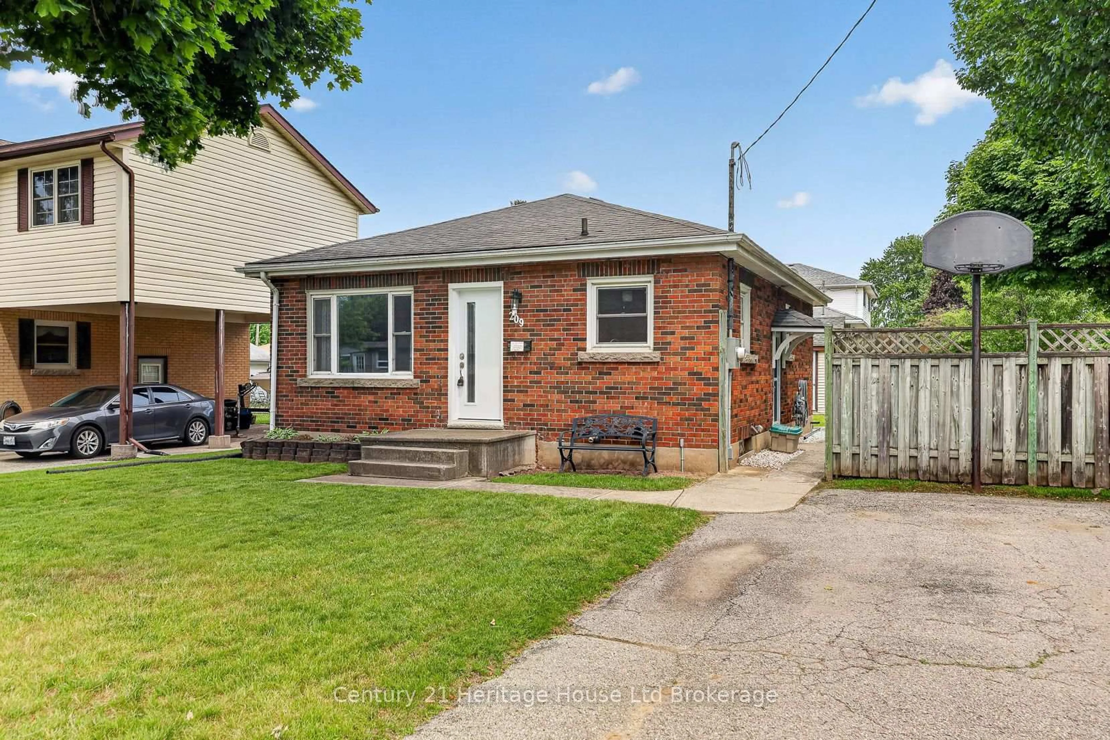 Home with brick exterior material, street for 209 Butler St, Woodstock Ontario N4S 3A8