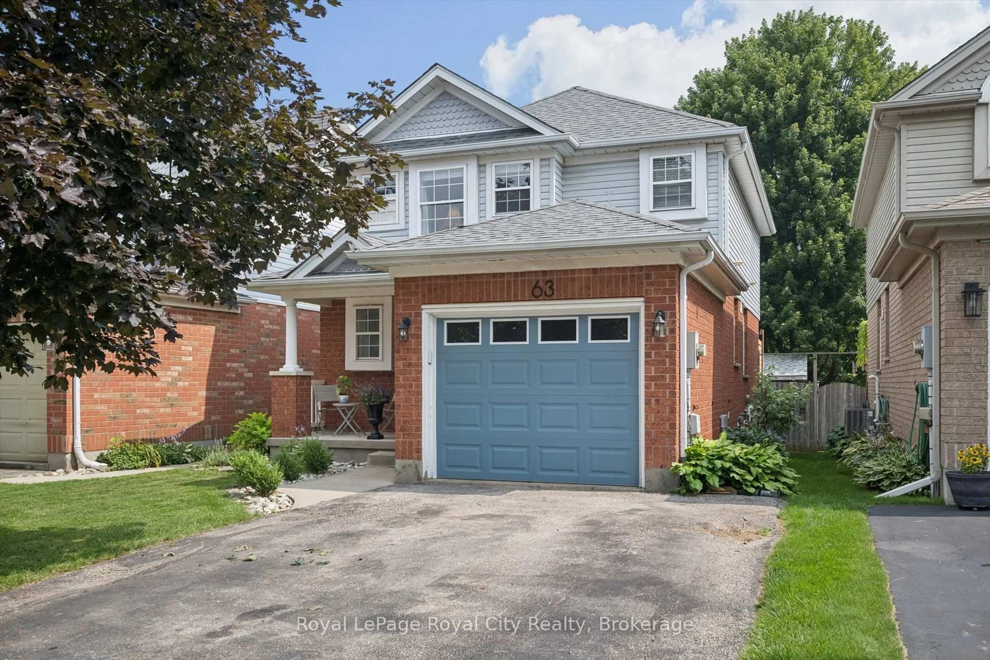 Home with brick exterior material, street for 63 STARVIEW Cres, Guelph Ontario N1E 6Z8