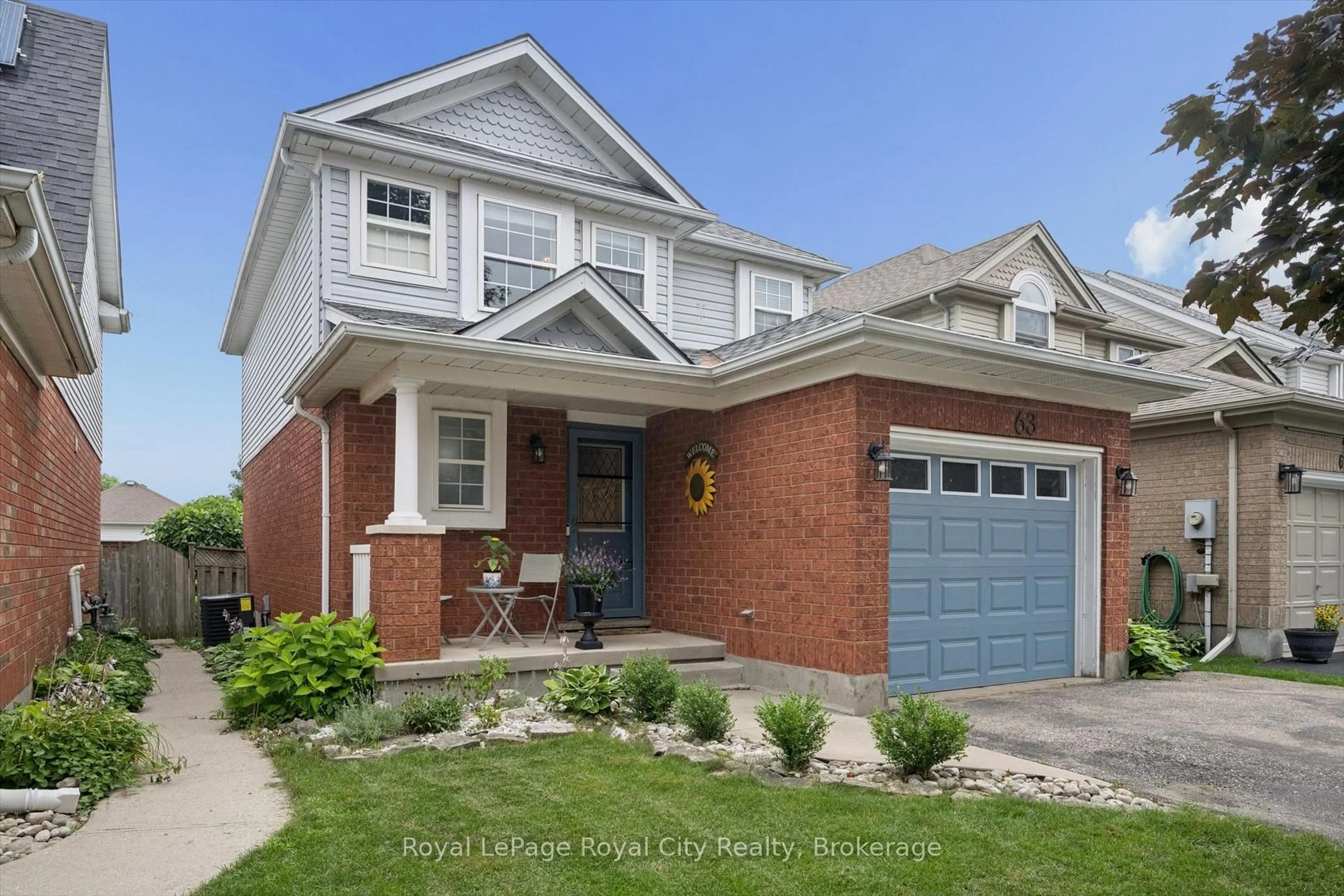 Home with brick exterior material, street for 63 STARVIEW Cres, Guelph Ontario N1E 6Z8