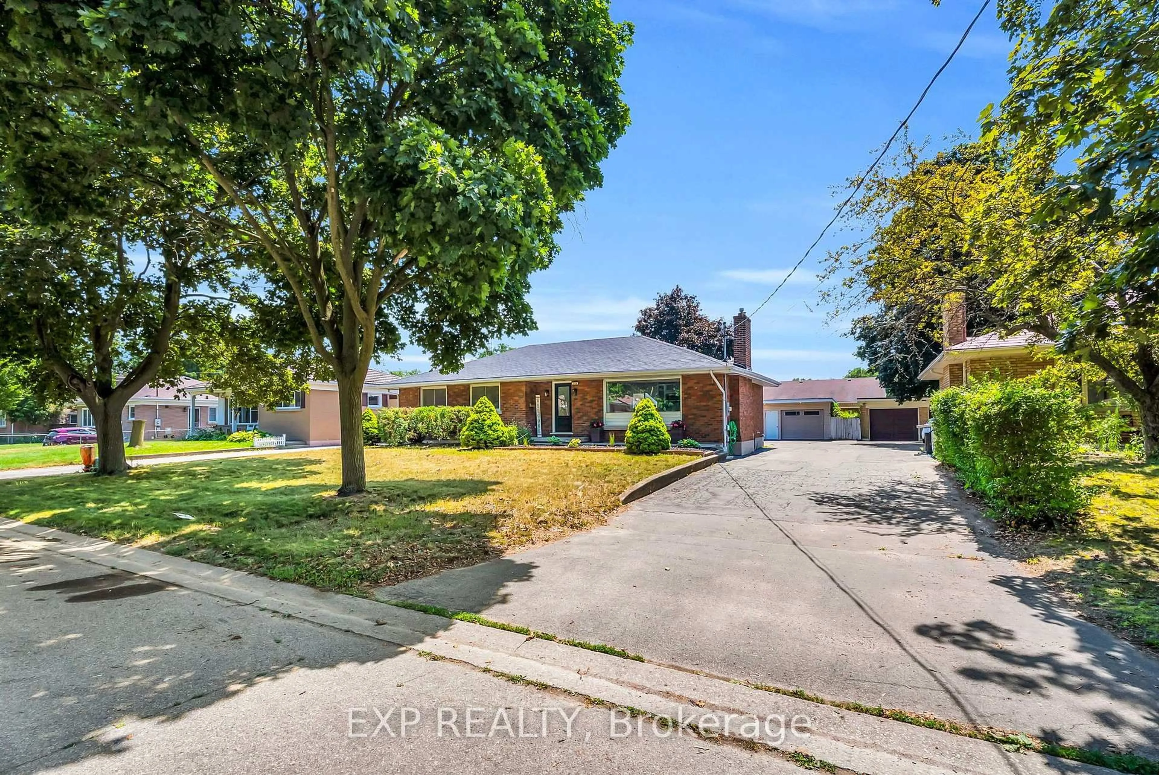 A pic from outside/outdoor area/front of a property/back of a property/a pic from drone, street for 19 Woodman Dr, Brantford Ontario N3S 4K2