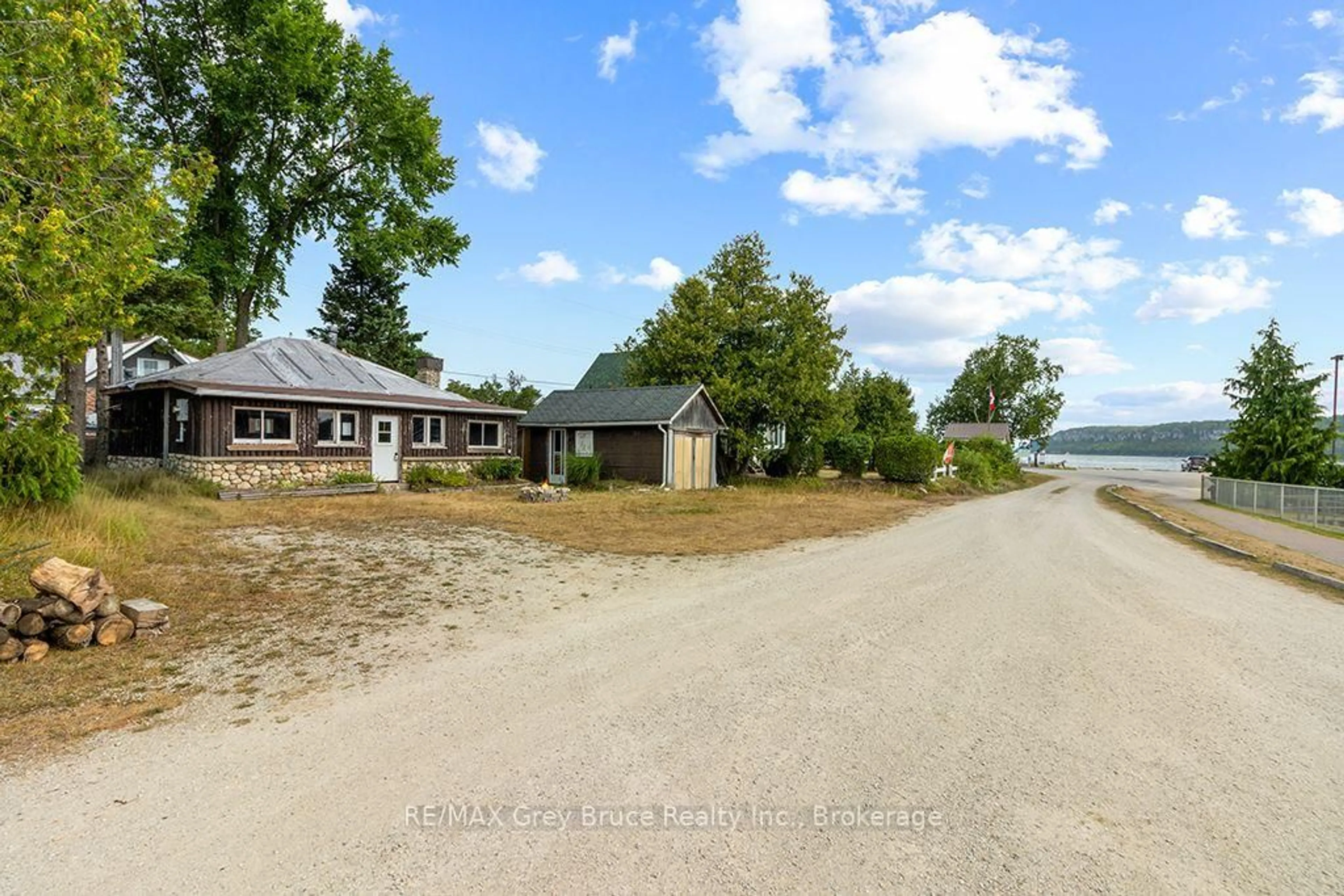 A pic from outside/outdoor area/front of a property/back of a property/a pic from drone, water/lake/river/ocean view for 11 McNeil St, Northern Bruce Peninsula Ontario N0H 1W0