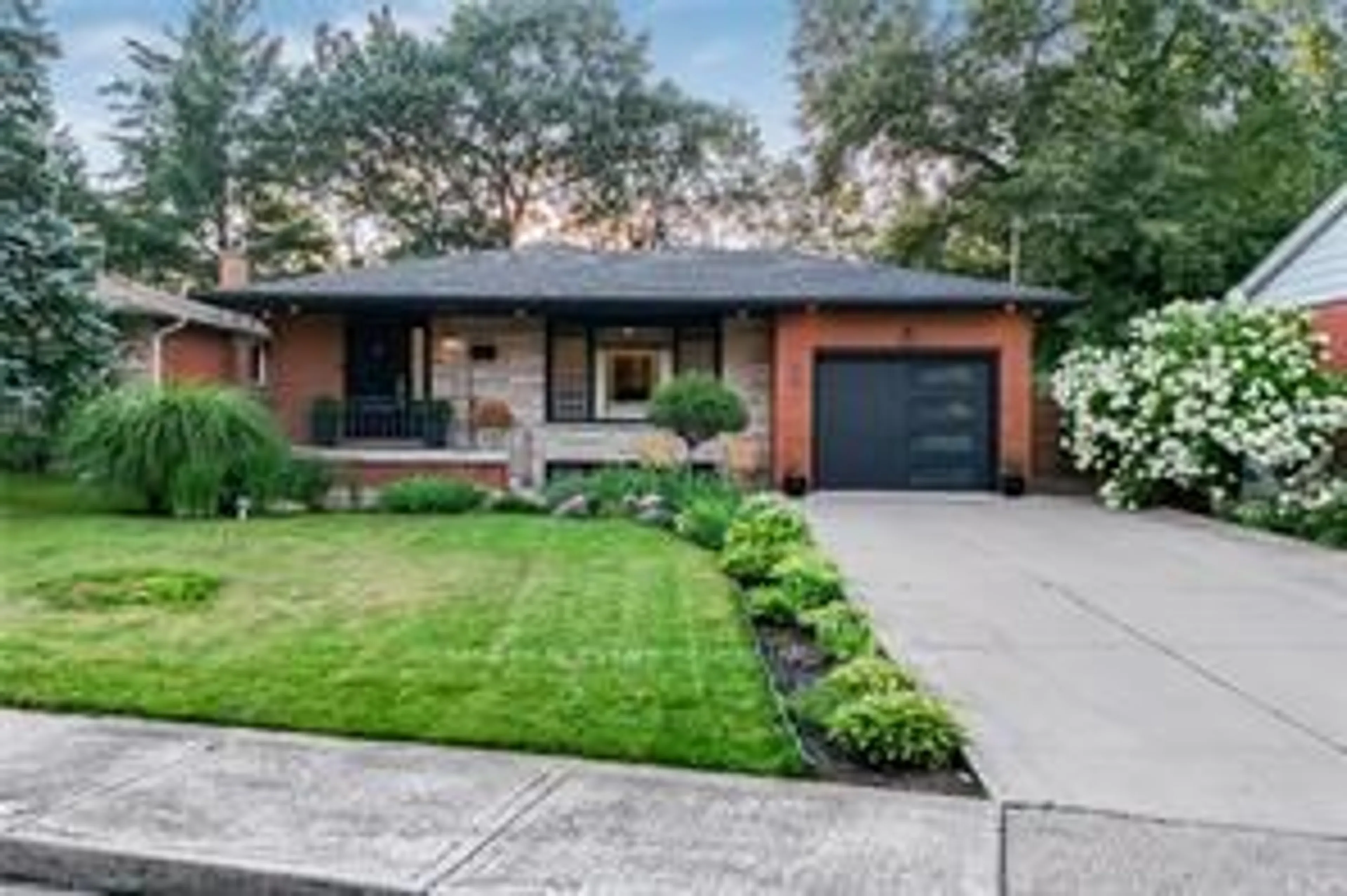 Home with brick exterior material, street for 24 Garvey Cres, Hamilton Ontario L8K 3X1