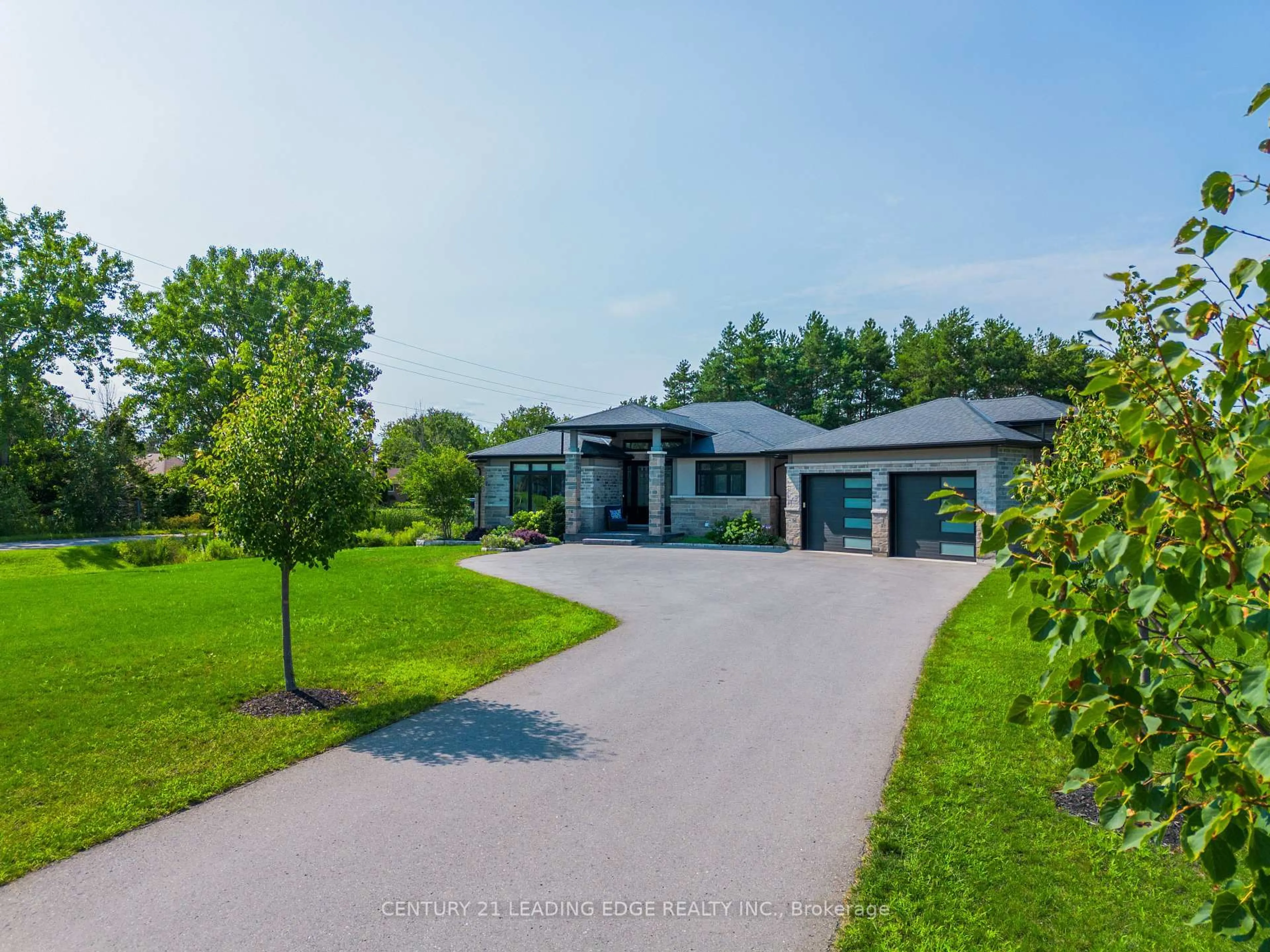 A pic from outside/outdoor area/front of a property/back of a property/a pic from drone, unknown for 9 Leaside St, Prince Edward County Ontario K8N 0G1