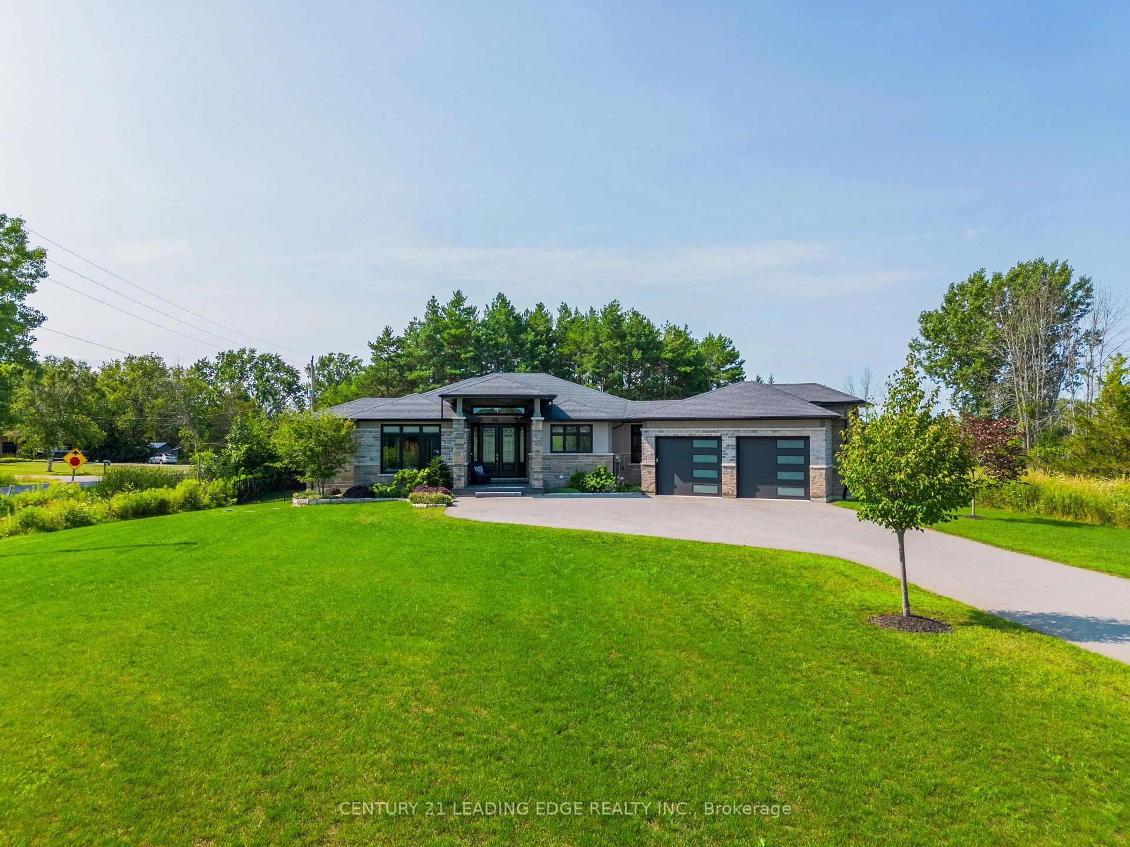 A pic from outside/outdoor area/front of a property/back of a property/a pic from drone, water/lake/river/ocean view for 9 Leaside St, Prince Edward County Ontario K8N 0G1