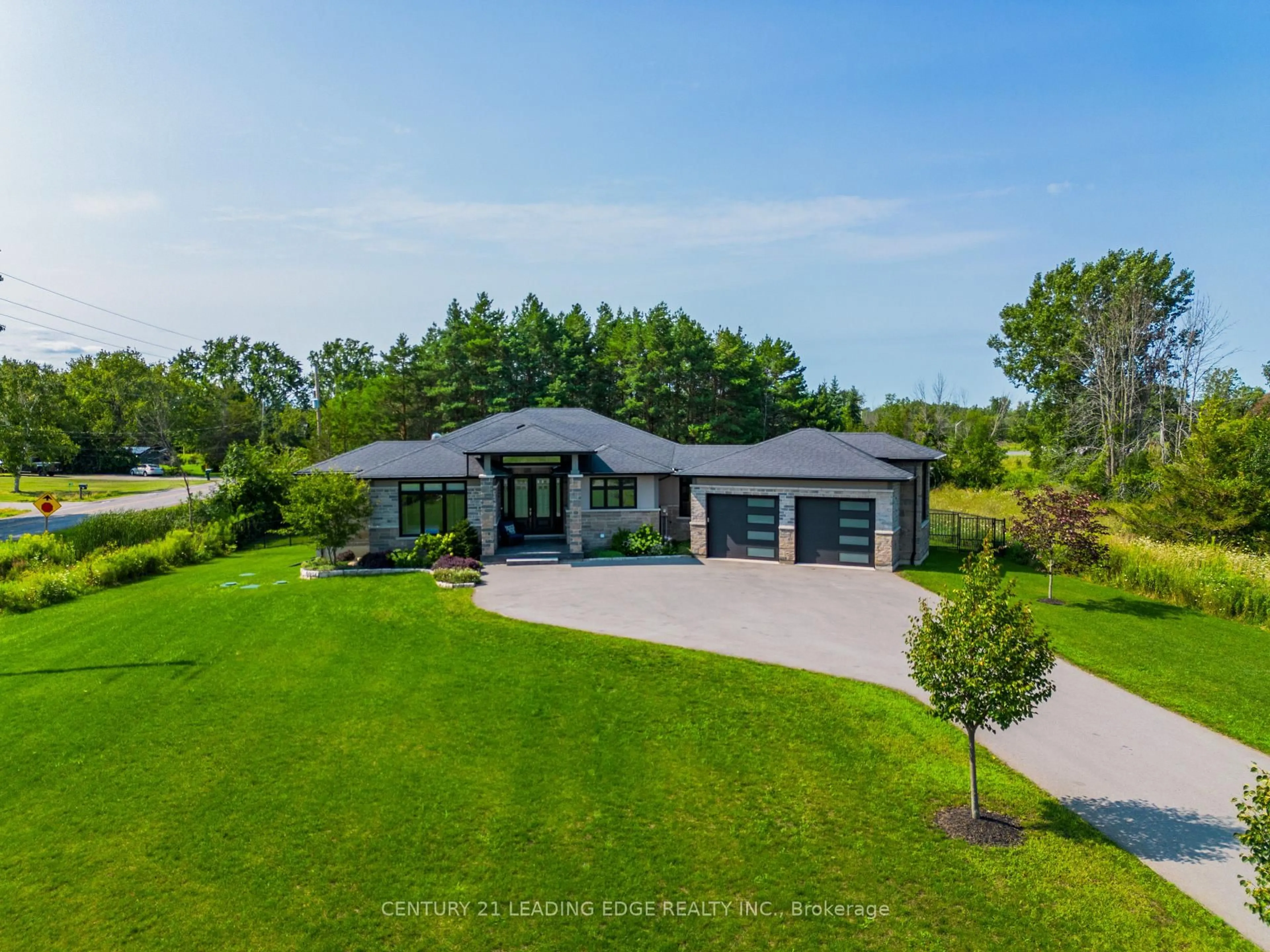 A pic from outside/outdoor area/front of a property/back of a property/a pic from drone, water/lake/river/ocean view for 9 Leaside St, Prince Edward County Ontario K8N 0G1