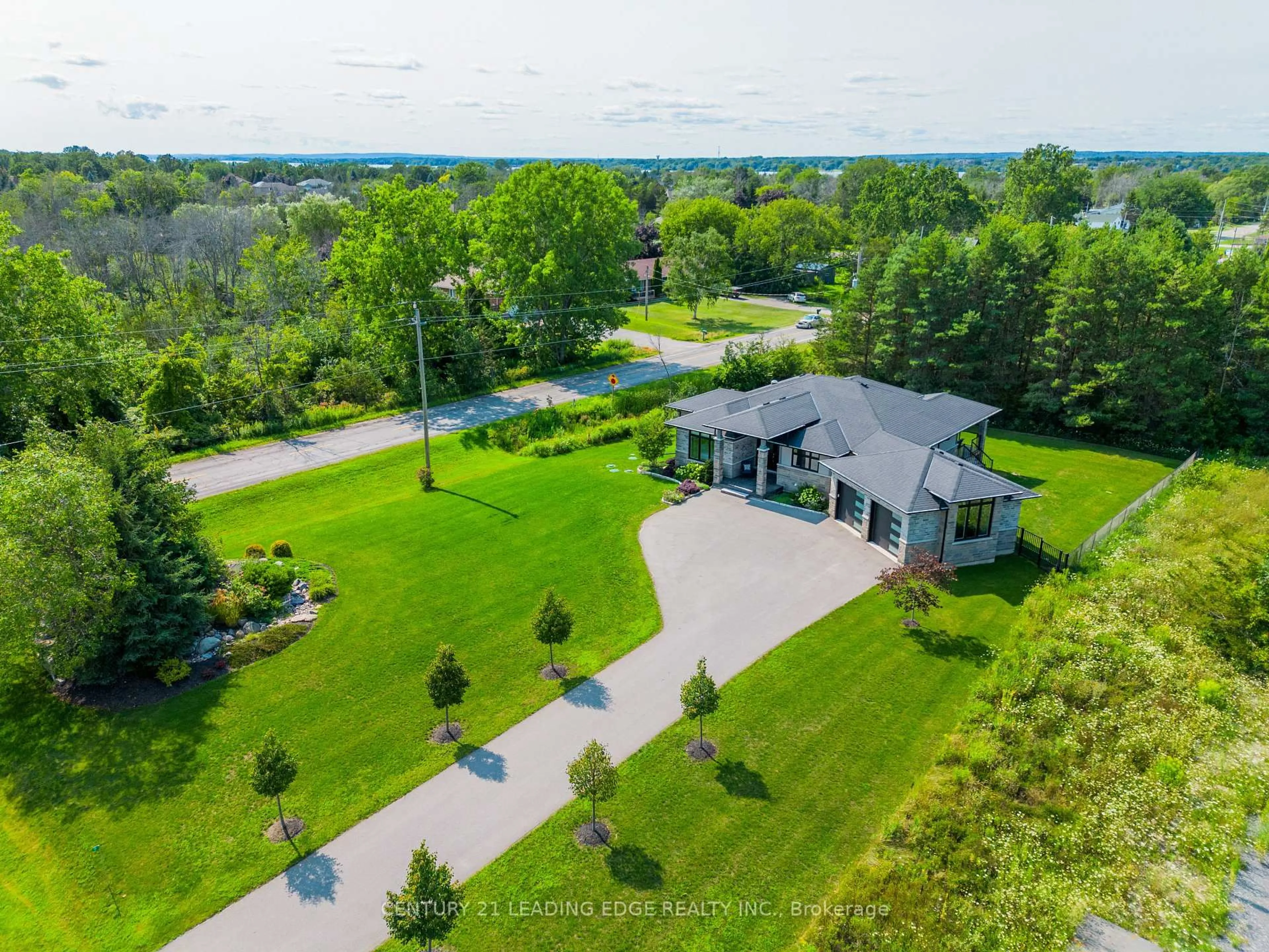 A pic from outside/outdoor area/front of a property/back of a property/a pic from drone, water/lake/river/ocean view for 9 Leaside St, Prince Edward County Ontario K8N 0G1