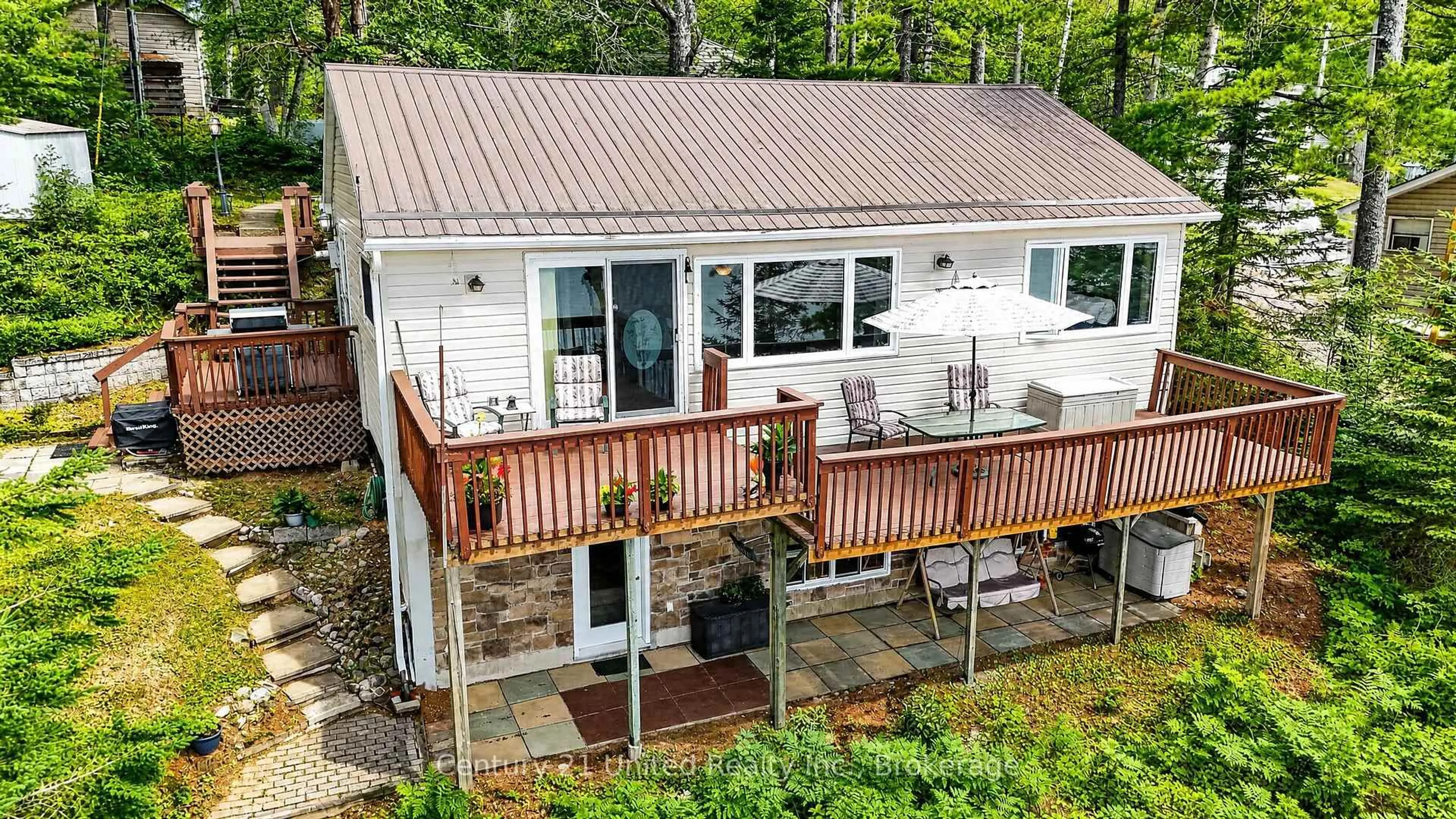 A pic from outside/outdoor area/front of a property/back of a property/a pic from drone, water/lake/river/ocean view for 166 Golden Shores Rd, Bancroft Ontario K0L 1C0