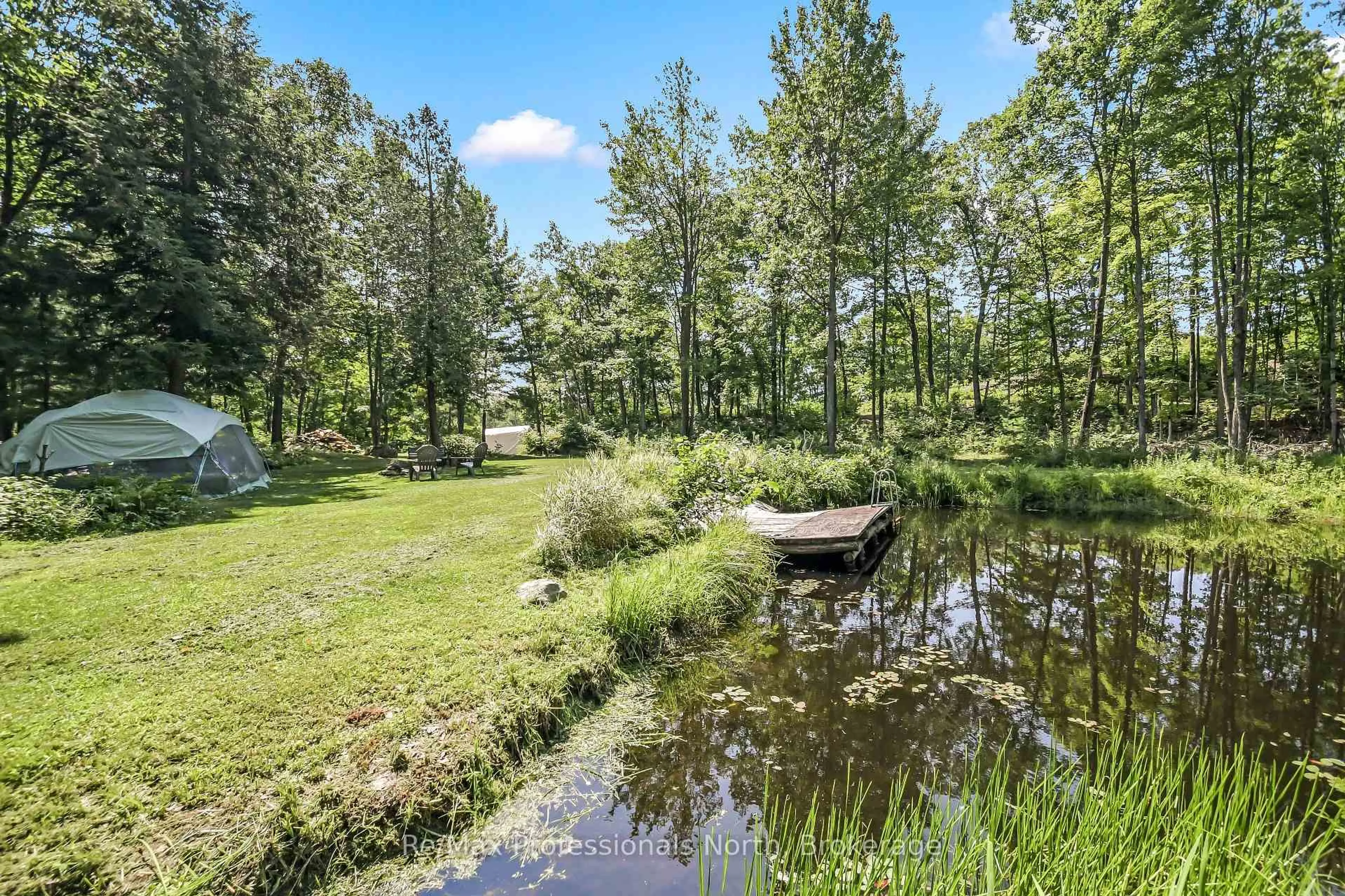 A pic from outside/outdoor area/front of a property/back of a property/a pic from drone, water/lake/river/ocean view for 1017 Barlochan Rd, Muskoka Lakes Ontario P1P 1R2
