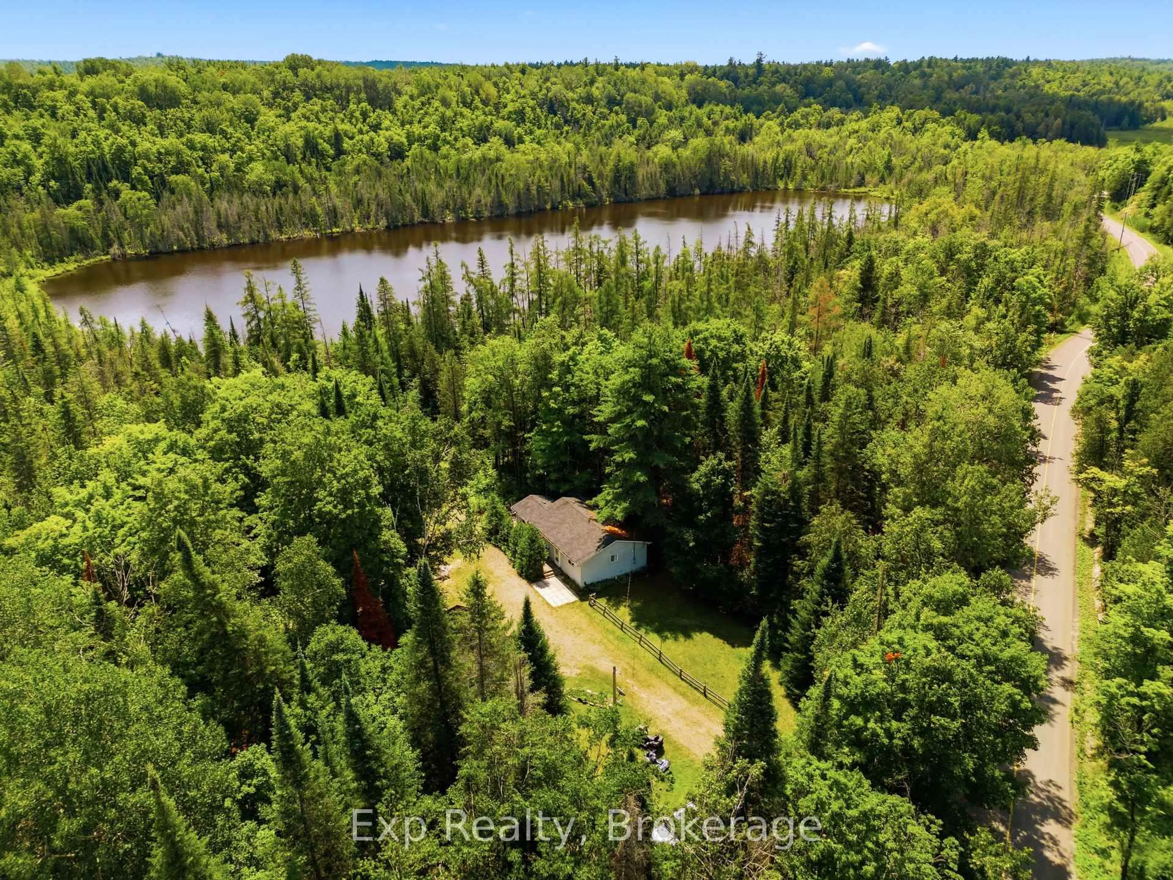 A pic from outside/outdoor area/front of a property/back of a property/a pic from drone, water/lake/river/ocean view for 5164 Arden Rd, Arden Ontario K0H 1B0