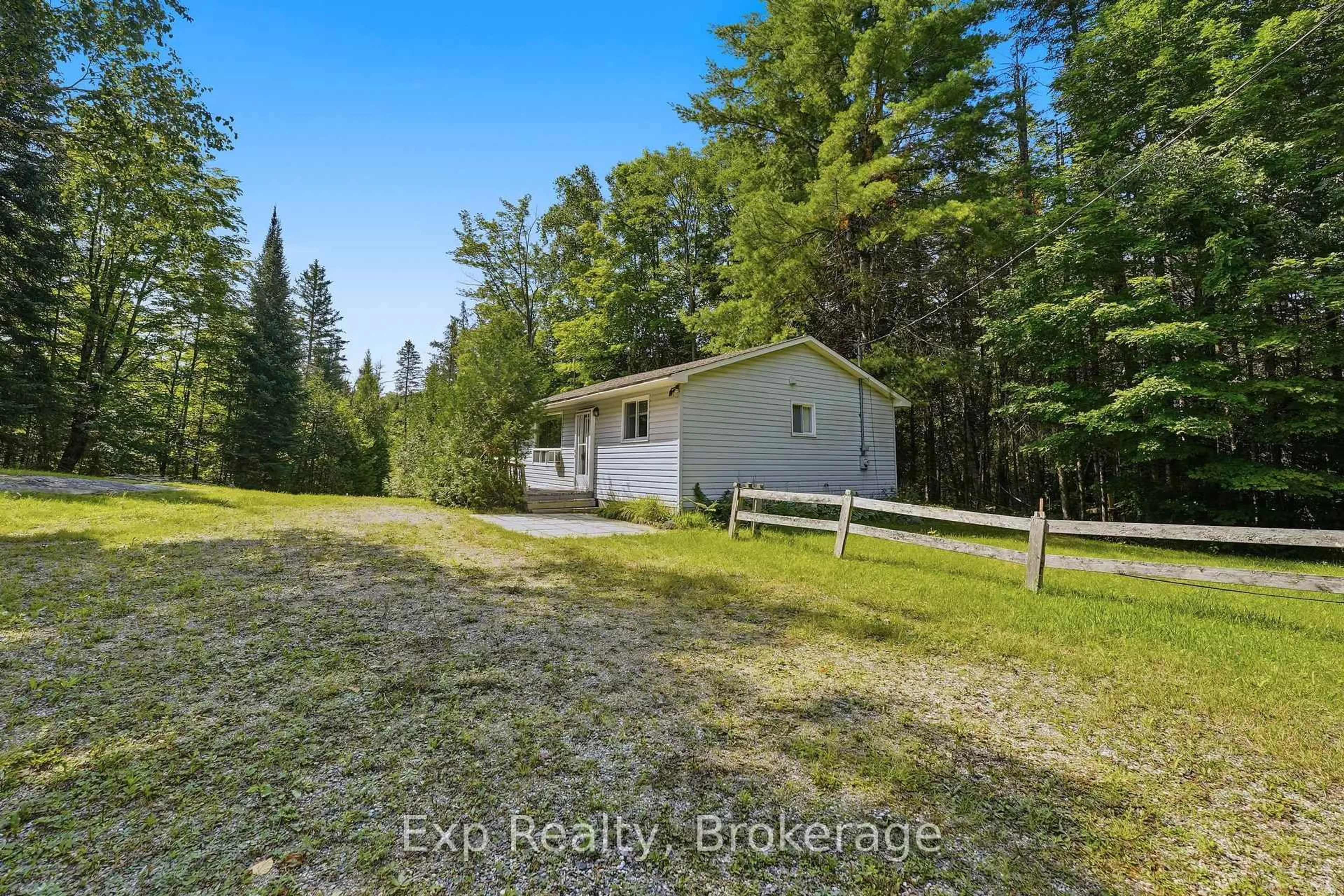 A pic from outside/outdoor area/front of a property/back of a property/a pic from drone, unknown for 5164 Arden Rd, Arden Ontario K0H 1B0