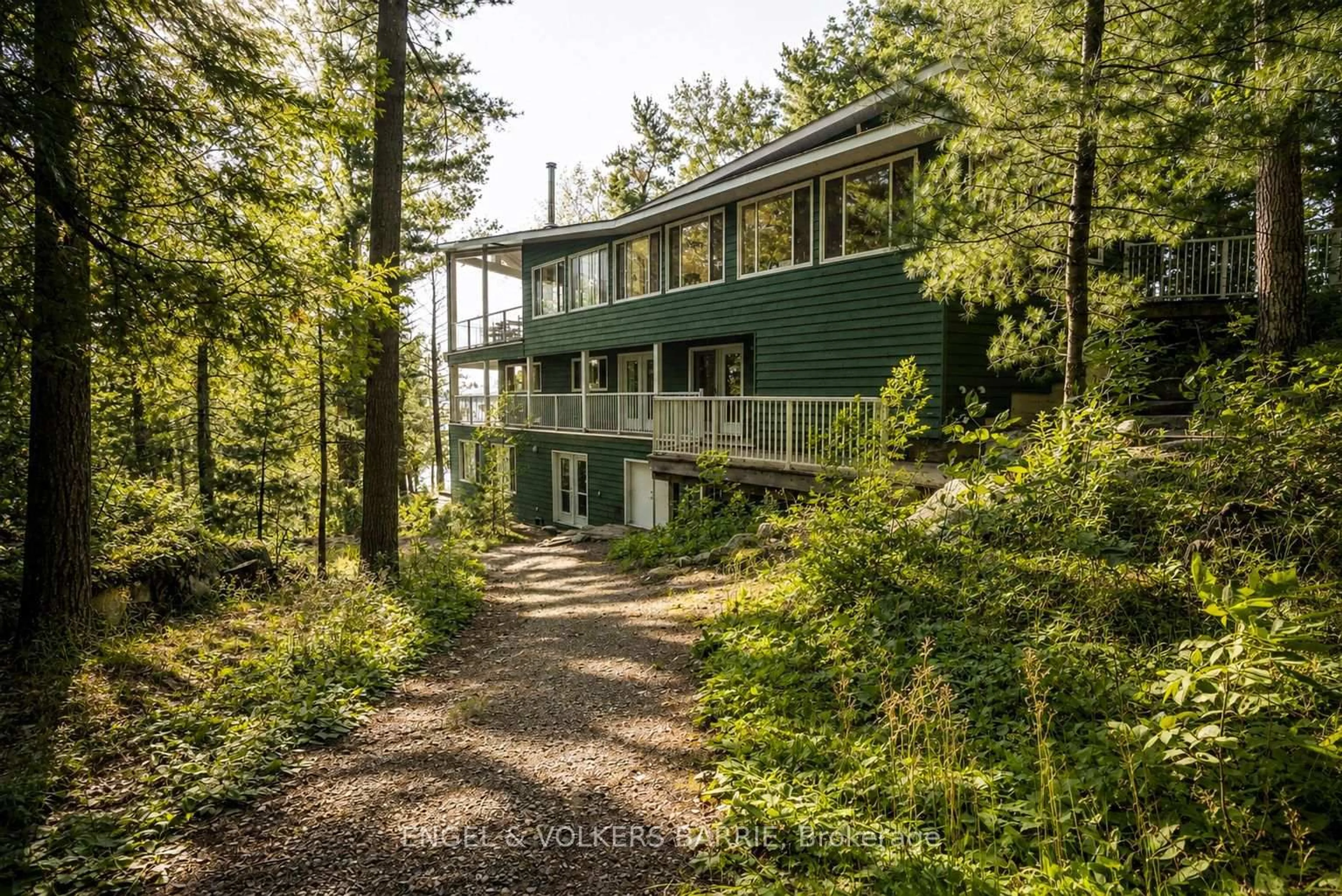 A pic from outside/outdoor area/front of a property/back of a property/a pic from drone, forest/trees view for 1 WASAN R40, Muskoka Lakes Ontario P0B 1J0