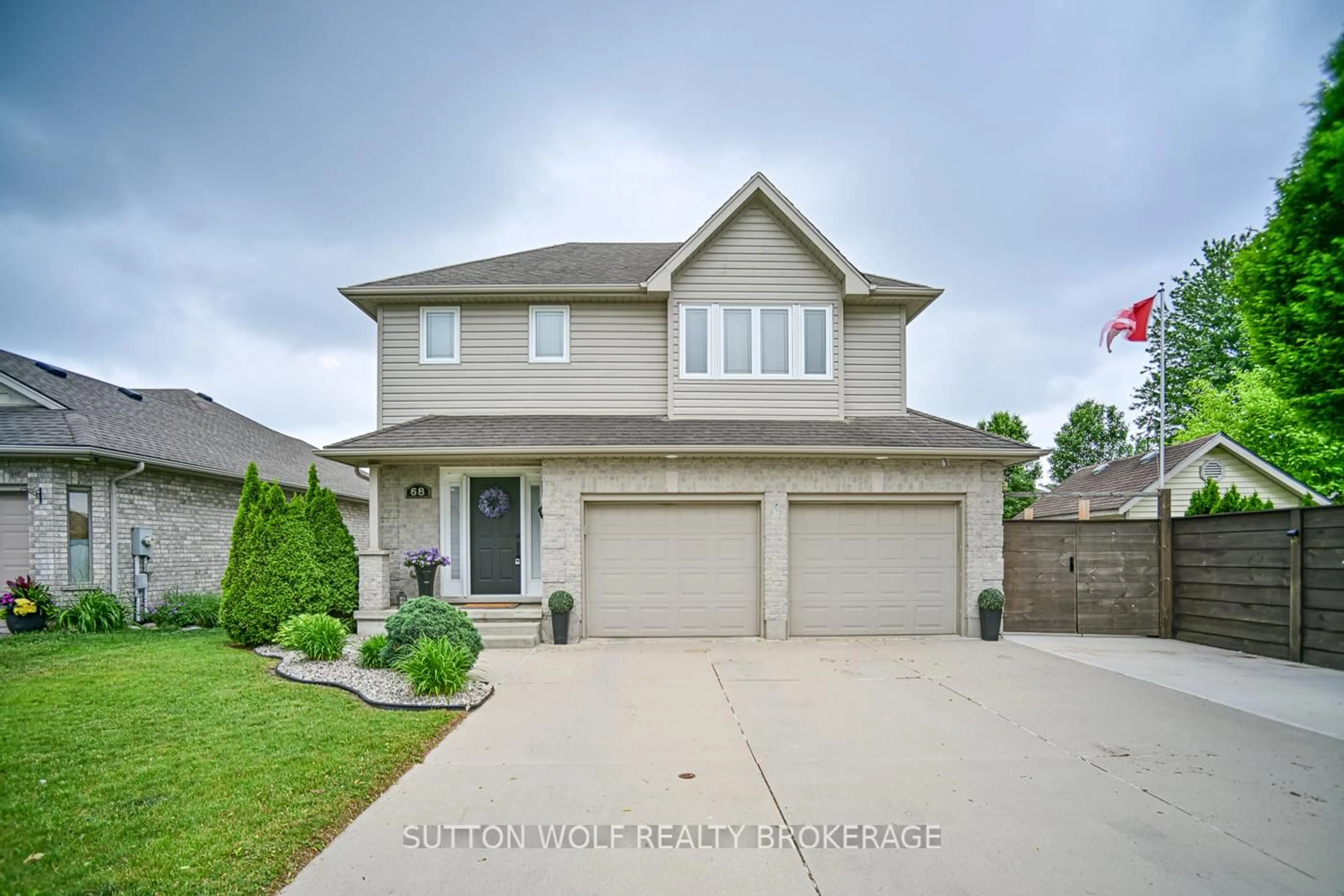 Home with vinyl exterior material, street for 68 Laura Lane, Strathroy-Caradoc Ontario N7G 4K9
