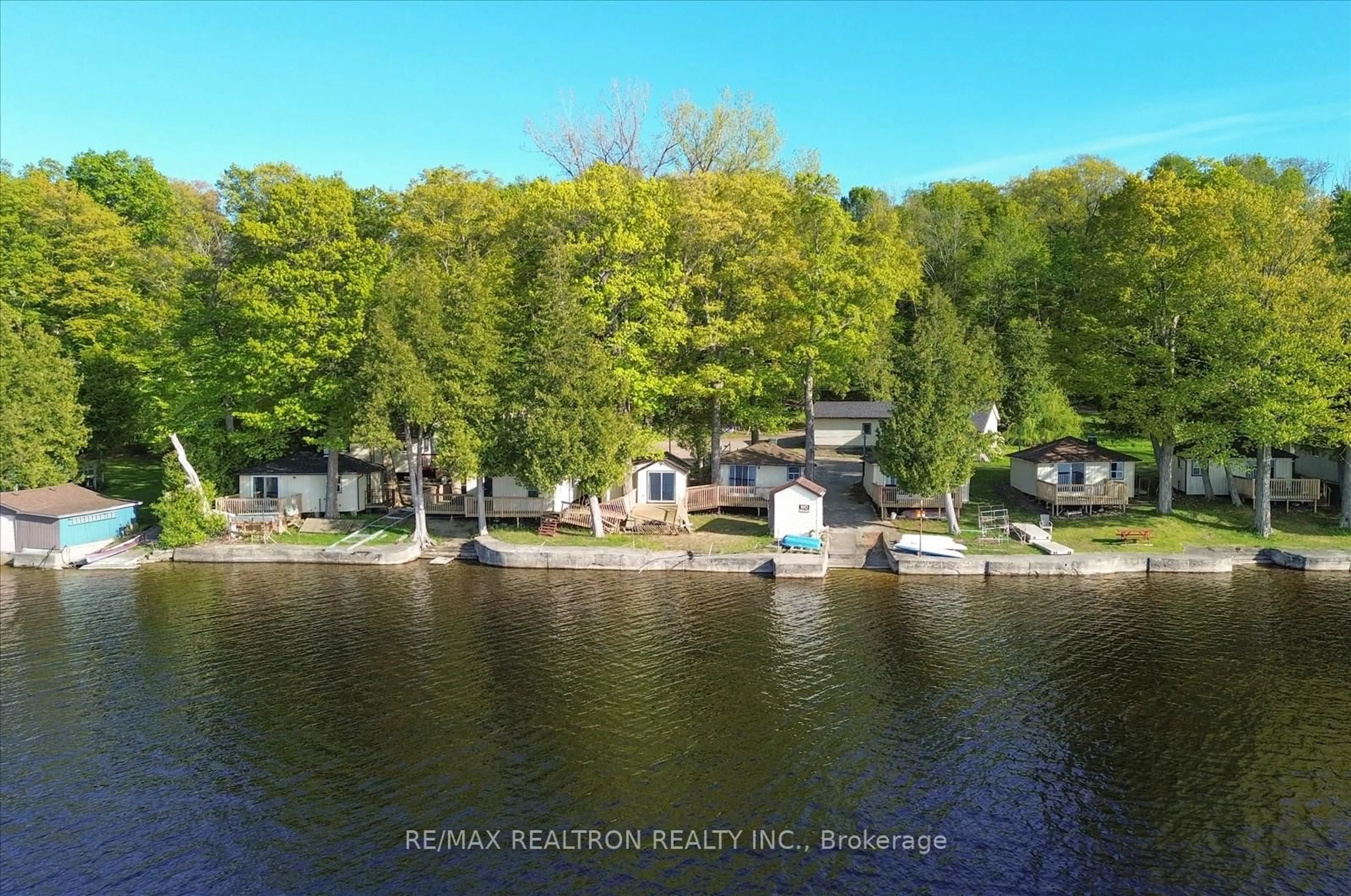 A pic from outside/outdoor area/front of a property/back of a property/a pic from drone, water/lake/river/ocean view for 33 Thistle Dew Lane, Prince Edward County Ontario K0K 1T0