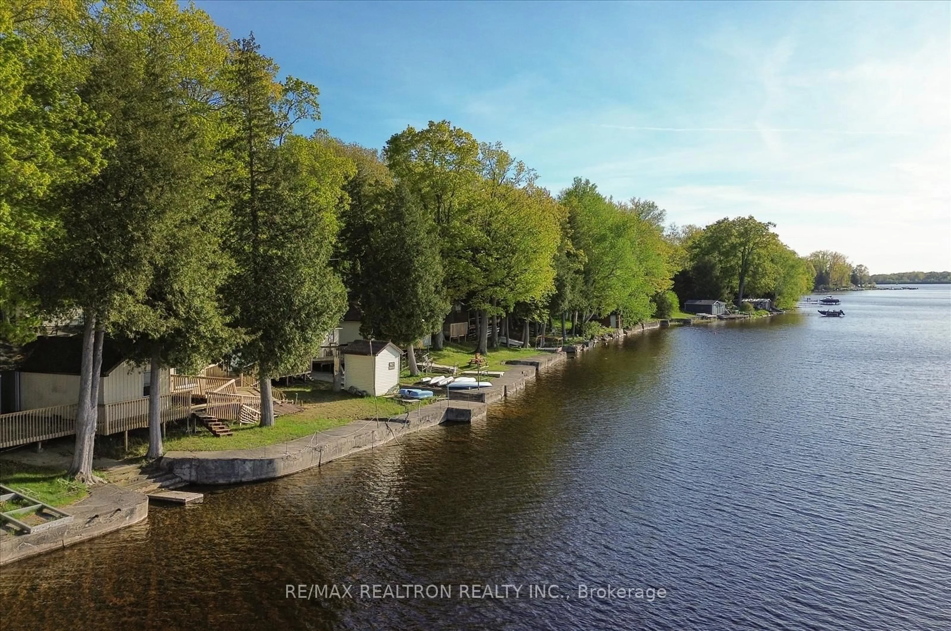 A pic from outside/outdoor area/front of a property/back of a property/a pic from drone, water/lake/river/ocean view for 33 Thistle Dew Lane, Prince Edward County Ontario K0K 1T0