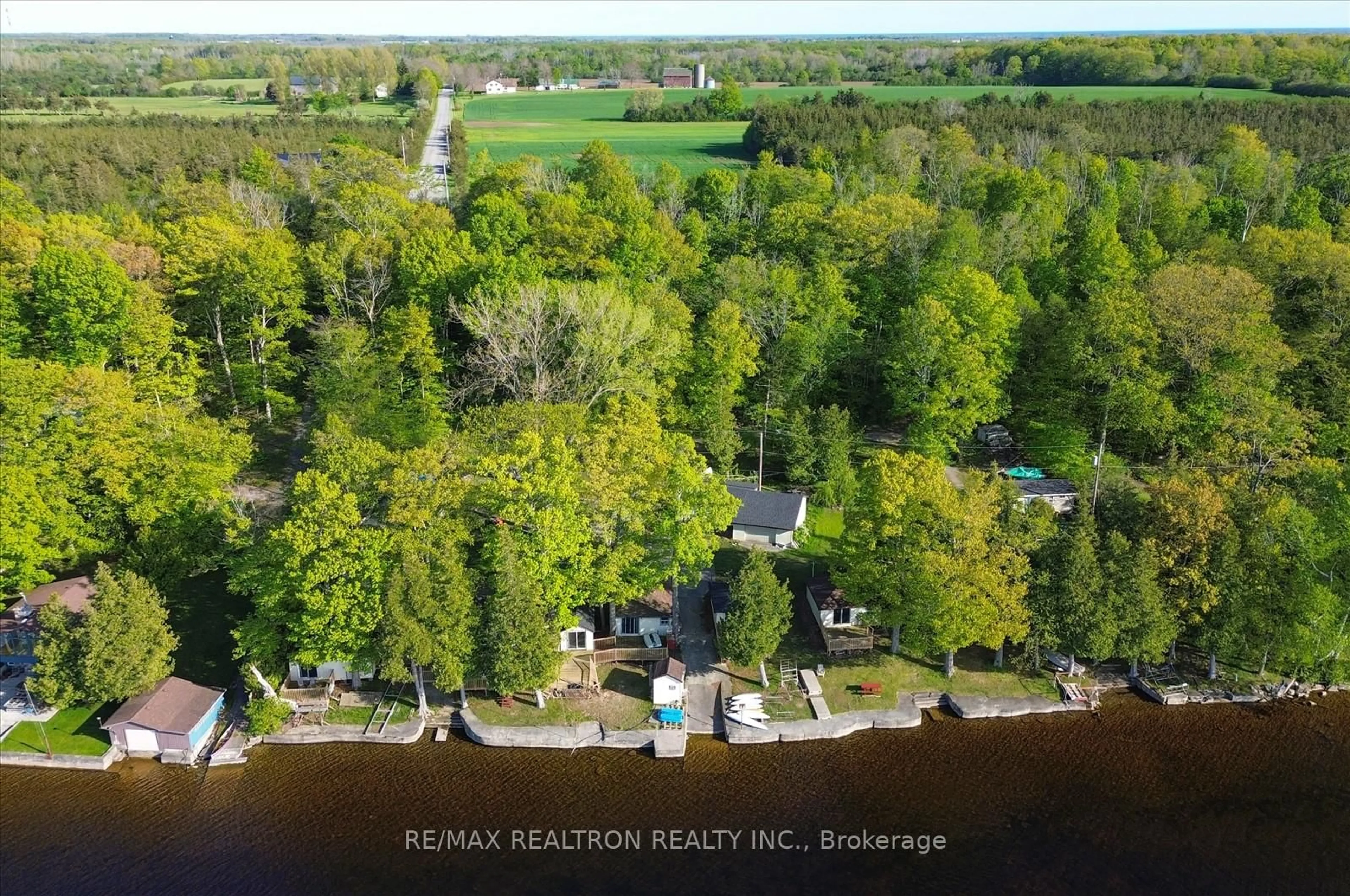A pic from outside/outdoor area/front of a property/back of a property/a pic from drone, water/lake/river/ocean view for 33 Thistle Dew Lane, Prince Edward County Ontario K0K 1T0