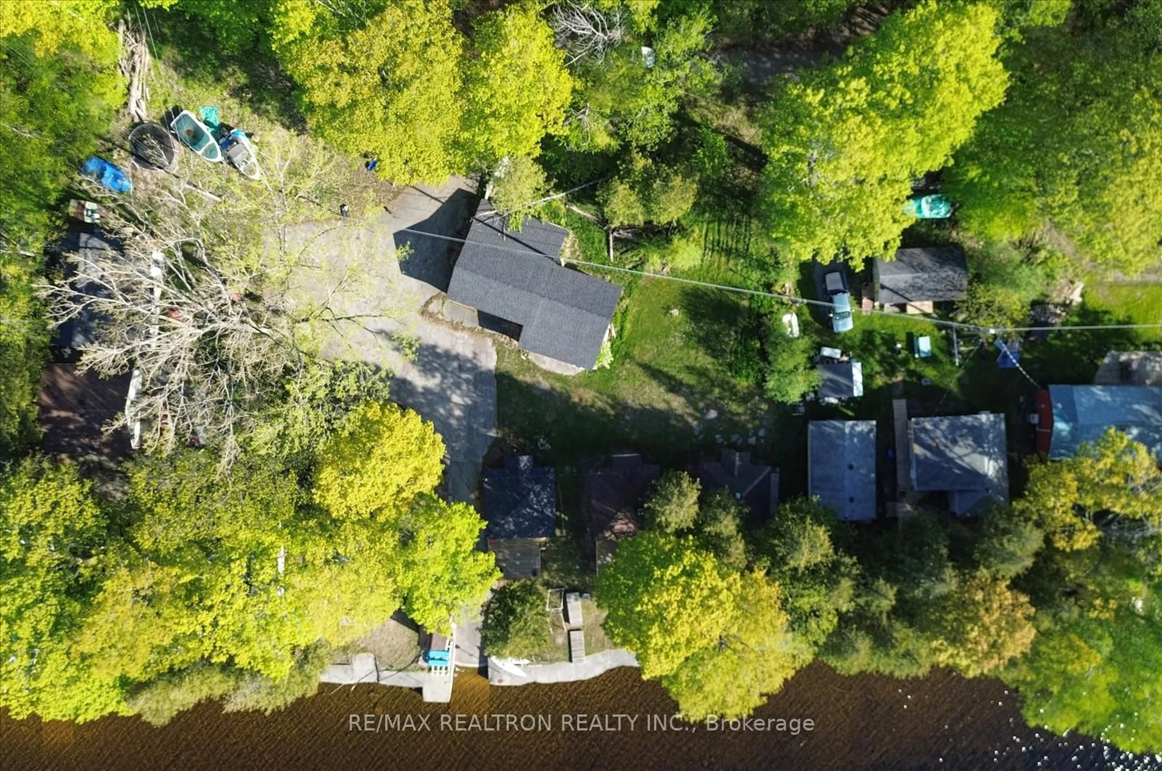 A pic from outside/outdoor area/front of a property/back of a property/a pic from drone, water/lake/river/ocean view for 33 Thistle Dew Lane, Prince Edward County Ontario K0K 1T0