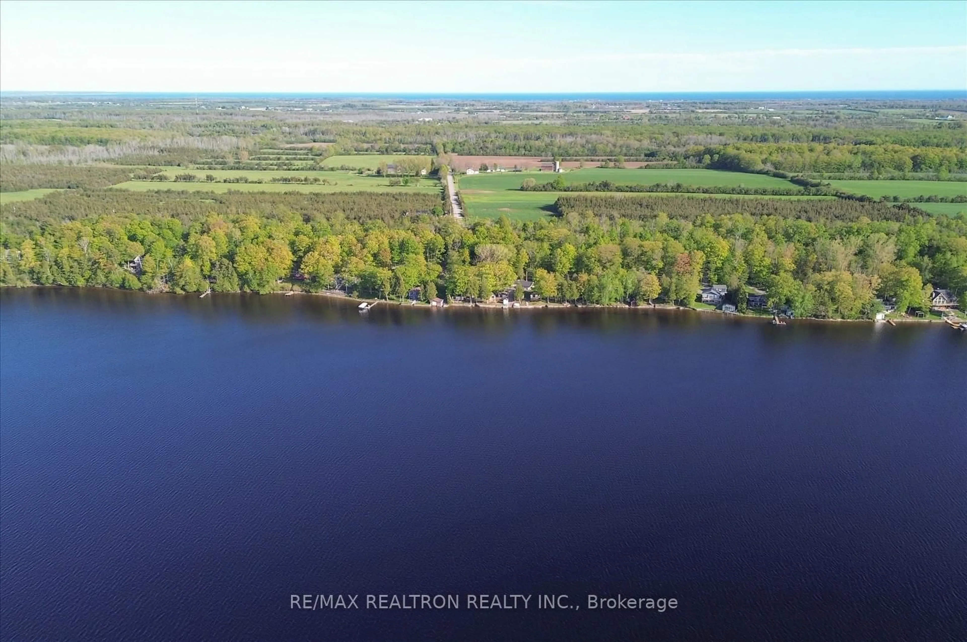 A pic from outside/outdoor area/front of a property/back of a property/a pic from drone, water/lake/river/ocean view for 33 Thistle Dew Lane, Prince Edward County Ontario K0K 1T0