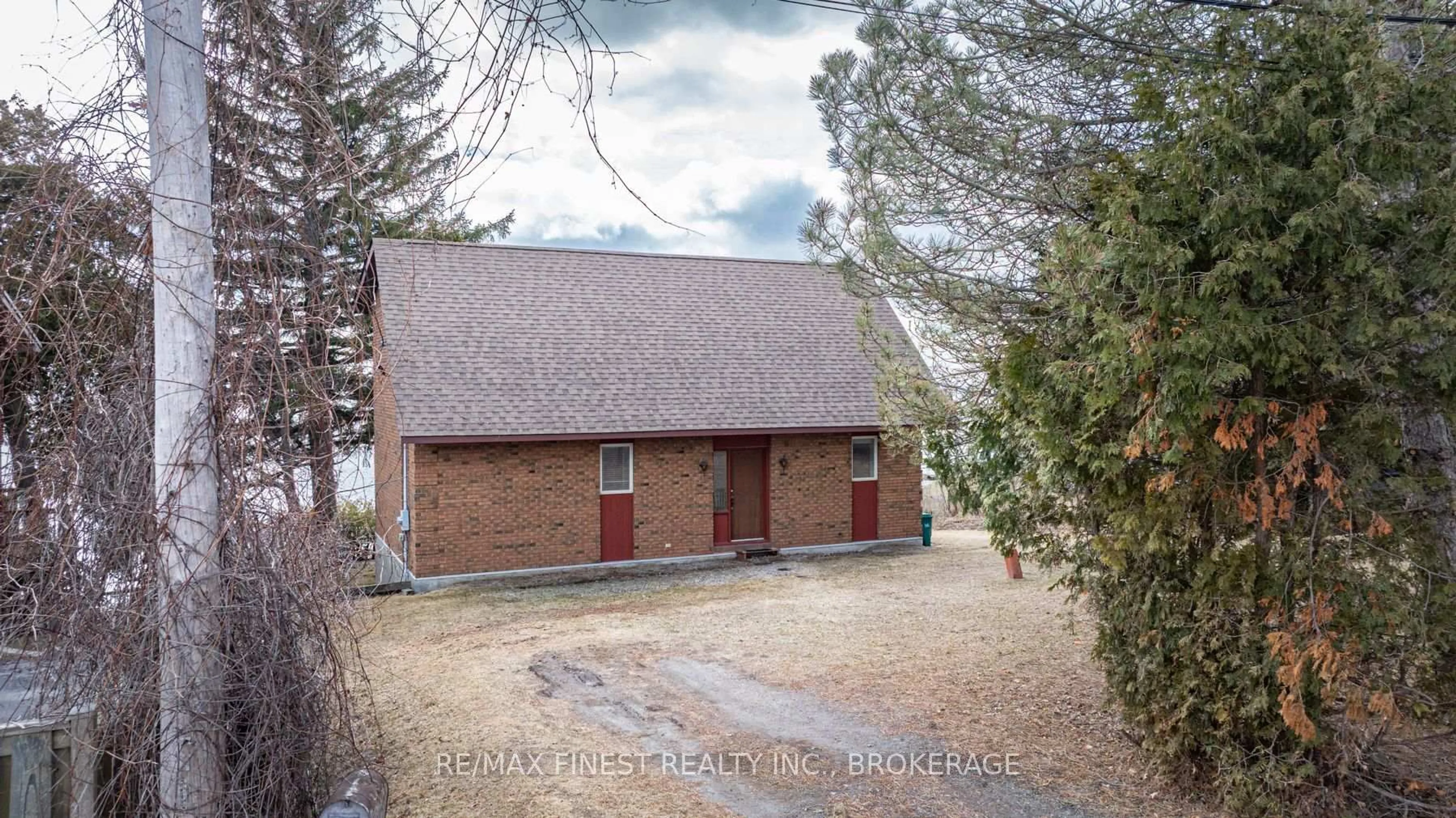 A pic from outside/outdoor area/front of a property/back of a property/a pic from drone, street for 1141 Front Rd, Kingston Ontario K7M 4M2