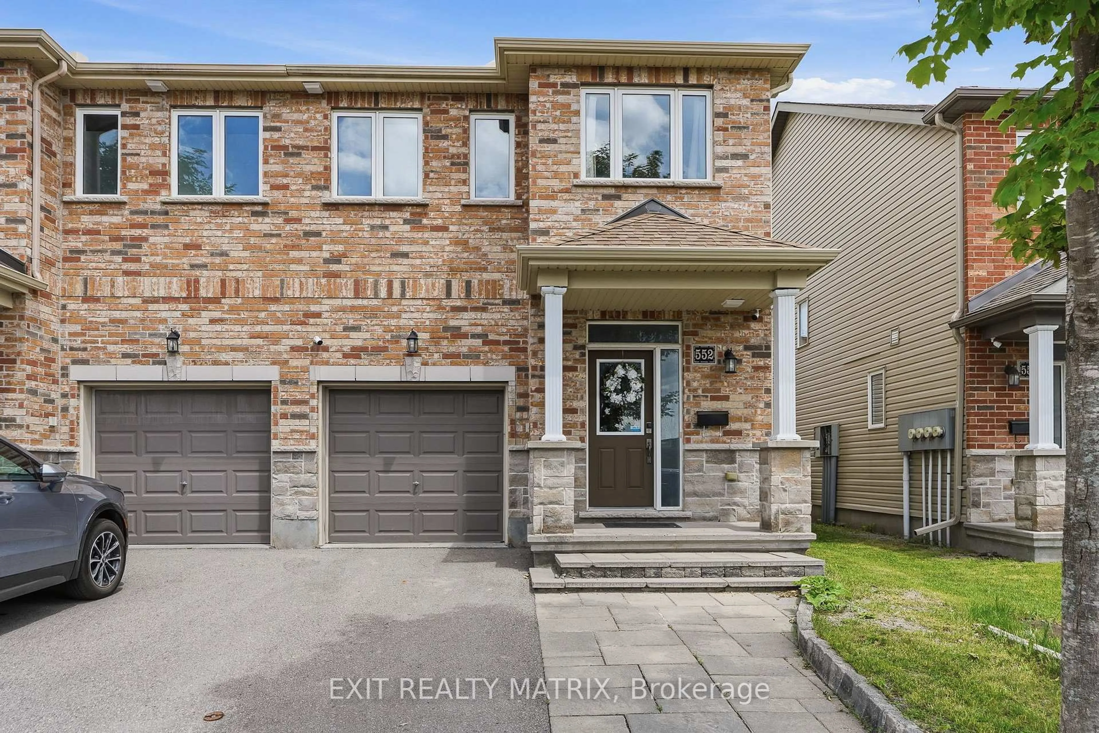 Home with brick exterior material, street for 552 Via Mattino Way, Nepean Ontario K2J 6B8