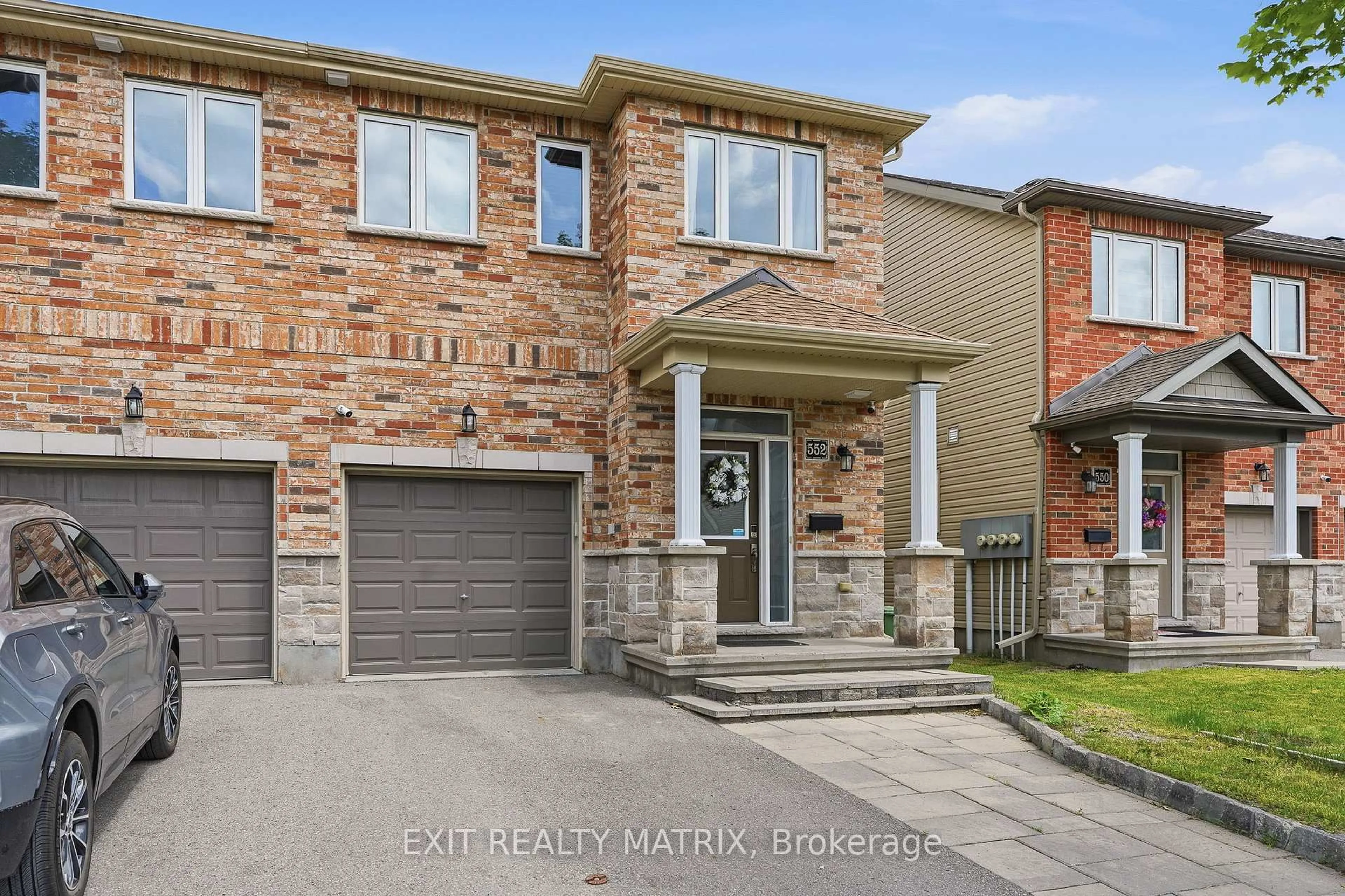 Home with brick exterior material, street for 552 Via Mattino Way, Nepean Ontario K2J 6B8