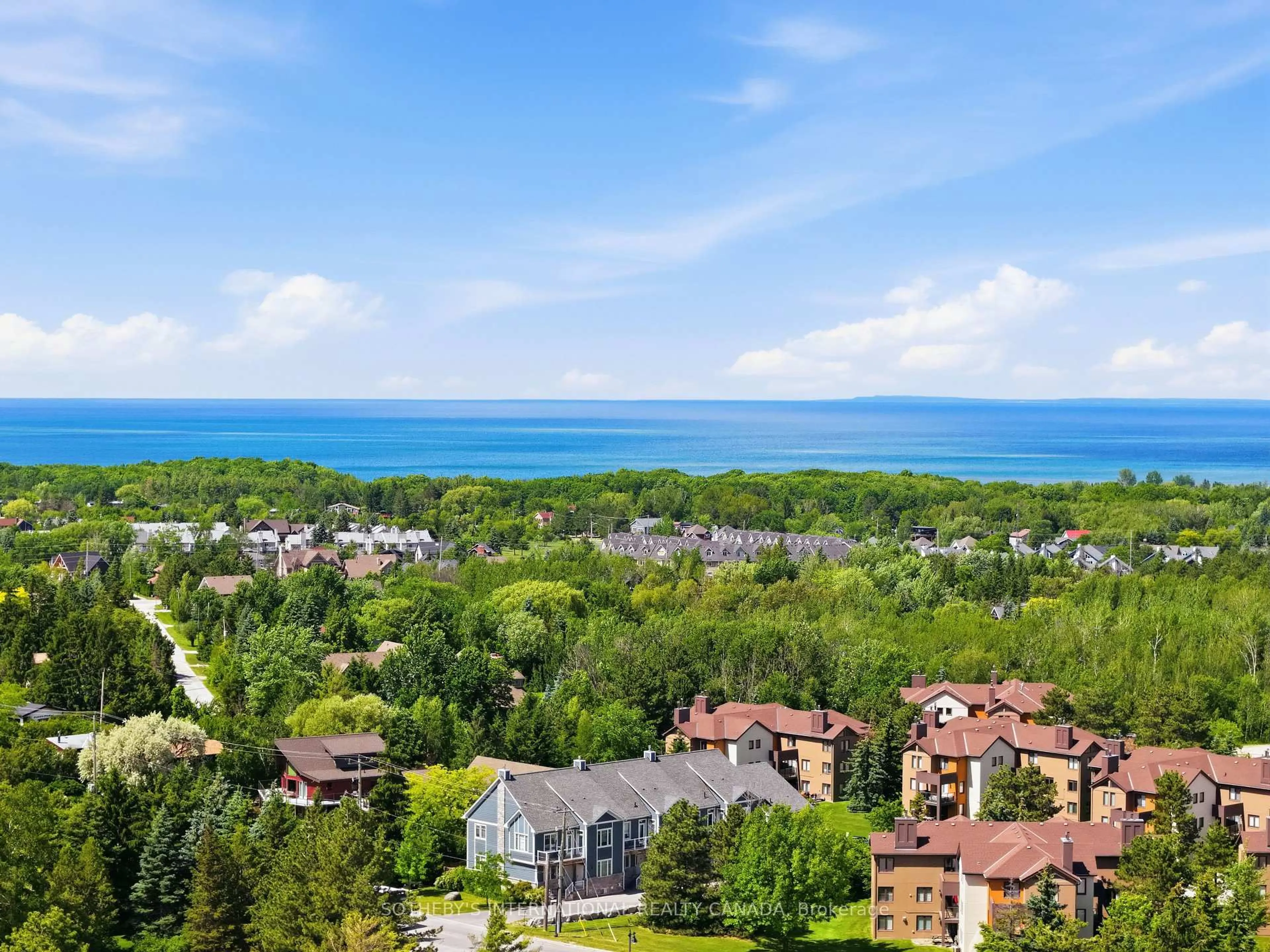 A pic from outside/outdoor area/front of a property/back of a property/a pic from drone, water/lake/river/ocean view for 145 Jozo Weider Blvd, Blue Mountains Ontario L9Y 3Z2