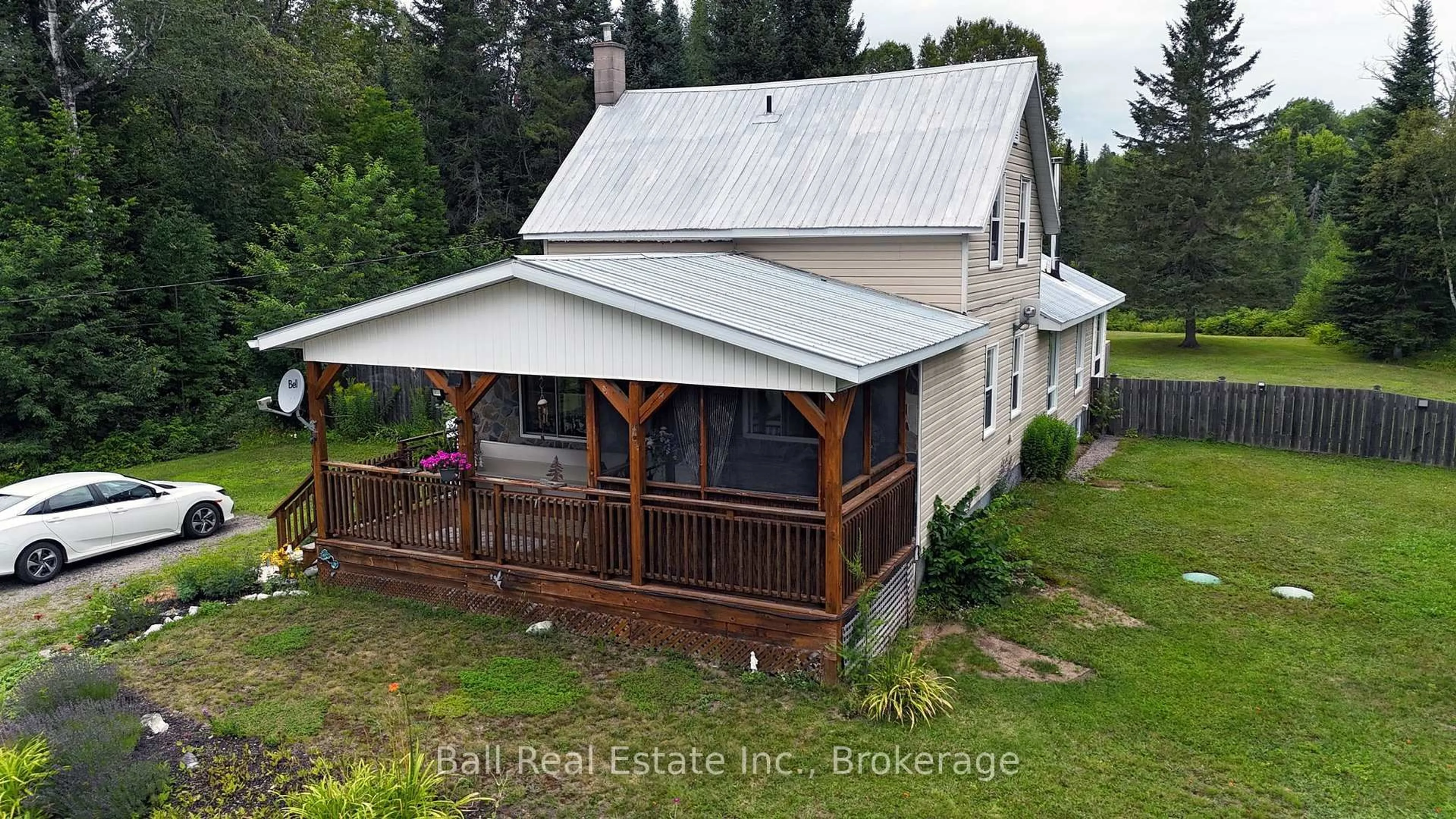A pic from outside/outdoor area/front of a property/back of a property/a pic from drone, building for 19573 Highway #118 Highway, Highlands East Ontario K0L 3C0