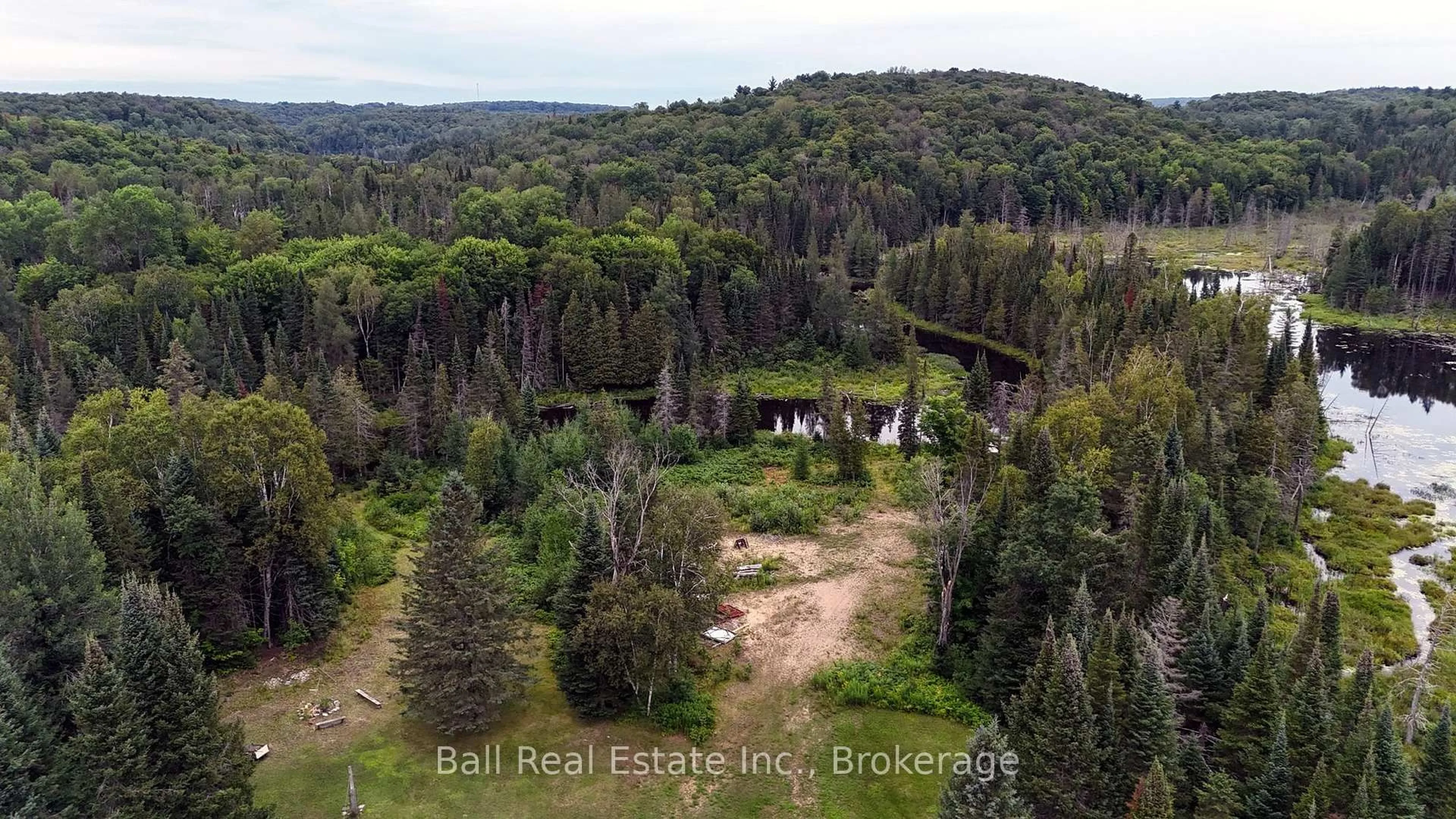 A pic from outside/outdoor area/front of a property/back of a property/a pic from drone, forest/trees view for 19573 Highway #118 Highway, Highlands East Ontario K0L 3C0
