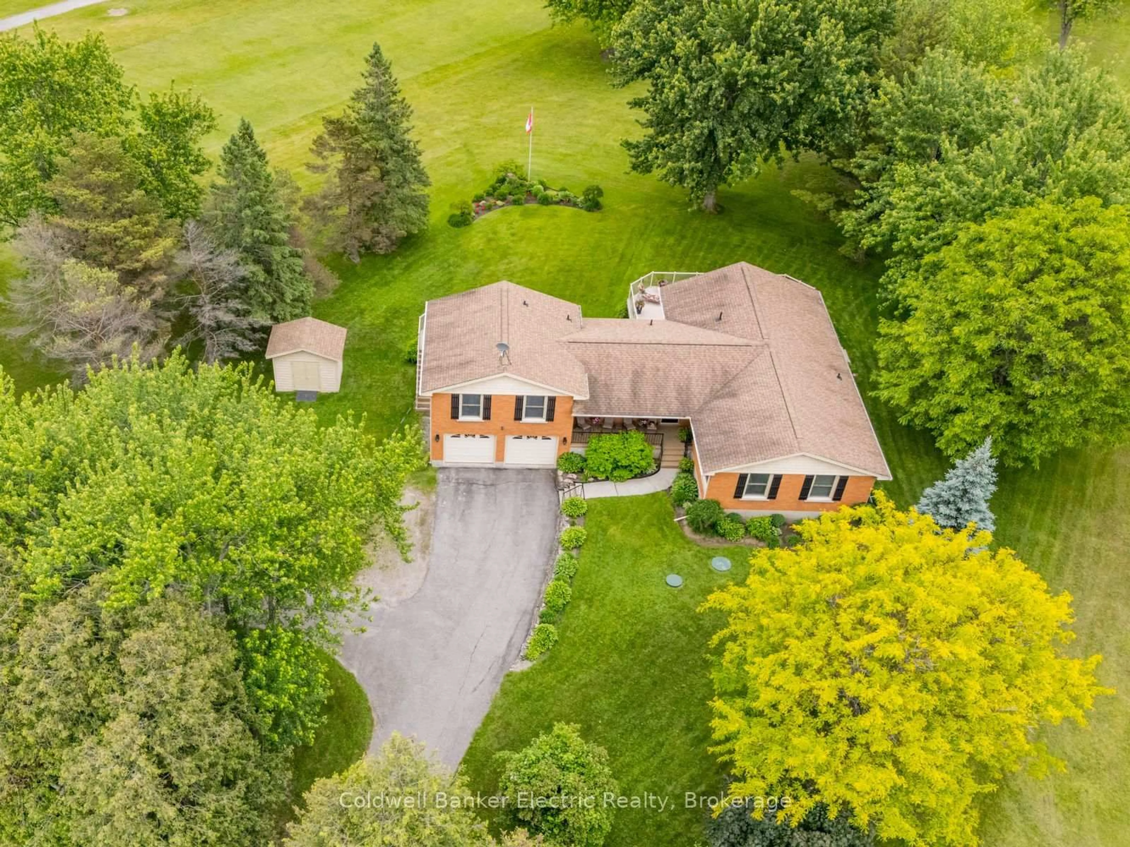 A pic from outside/outdoor area/front of a property/back of a property/a pic from drone, street for 2367 Base Line, Otonabee-South Monaghan Ontario K9J 6X9