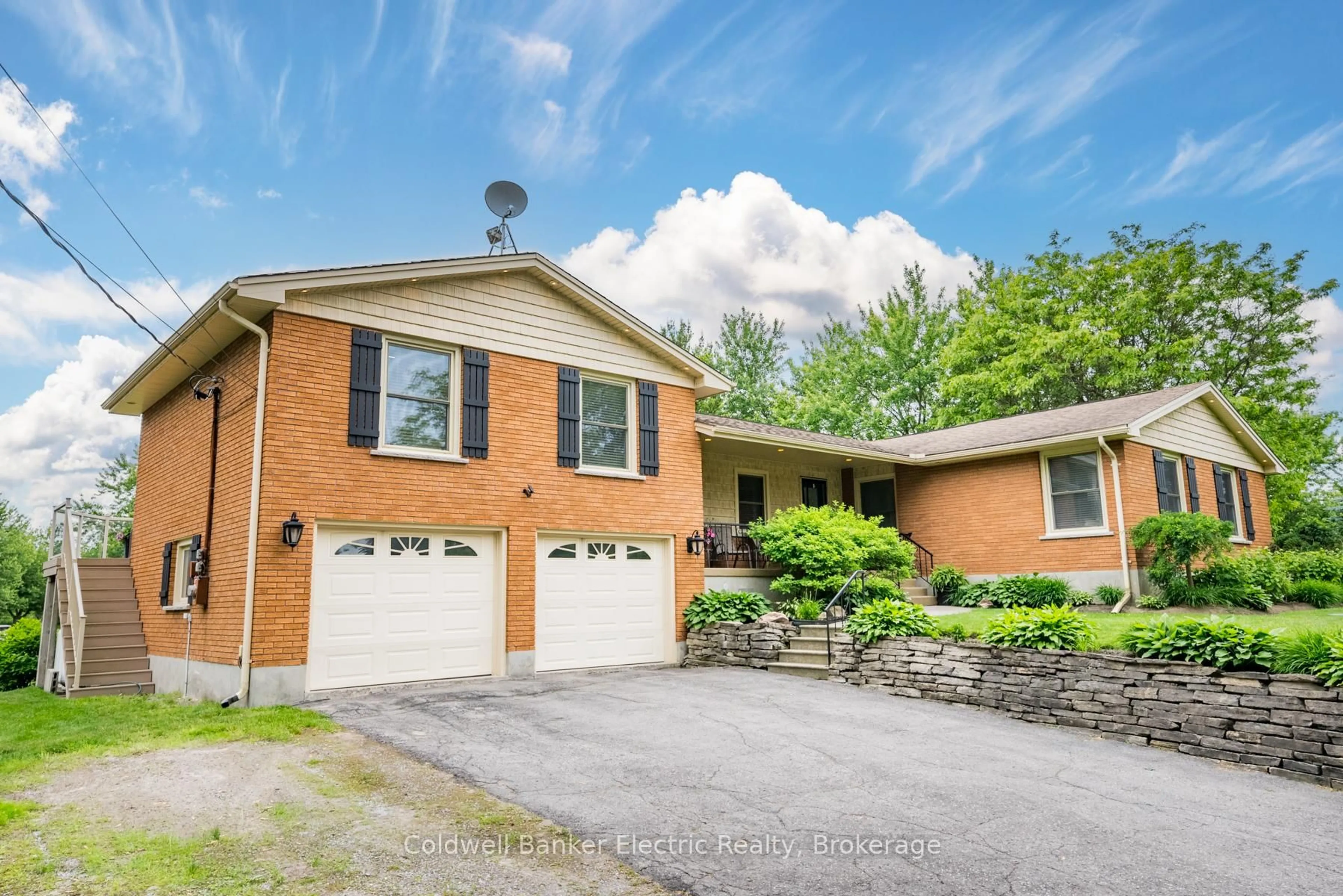 Home with brick exterior material, street for 2367 Base Line, Otonabee-South Monaghan Ontario K9J 6X9