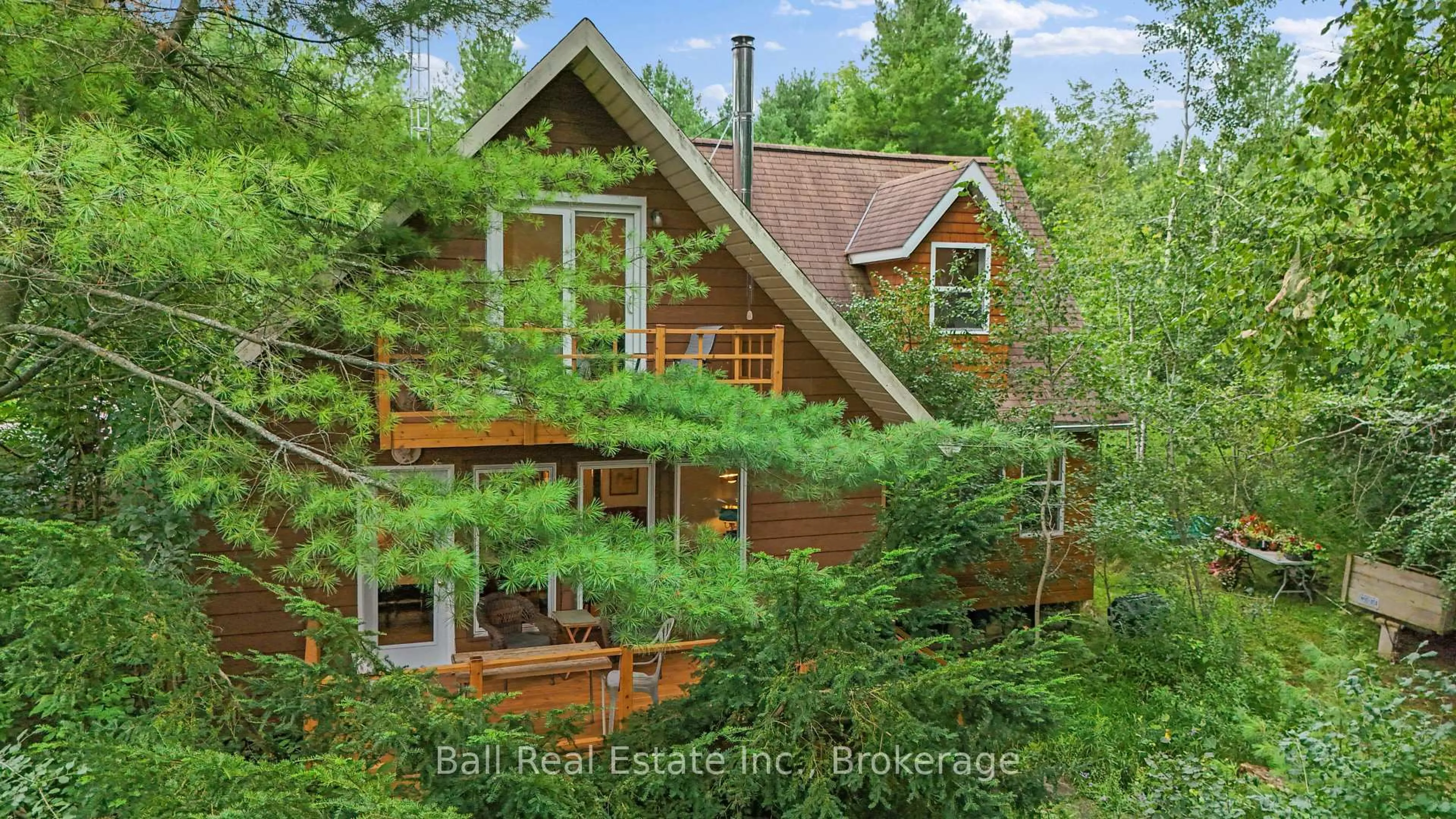 A pic from outside/outdoor area/front of a property/back of a property/a pic from drone, forest/trees view for 939 Seven Oaks Dr, Otonabee-South Monaghan Ontario K0L 1B0
