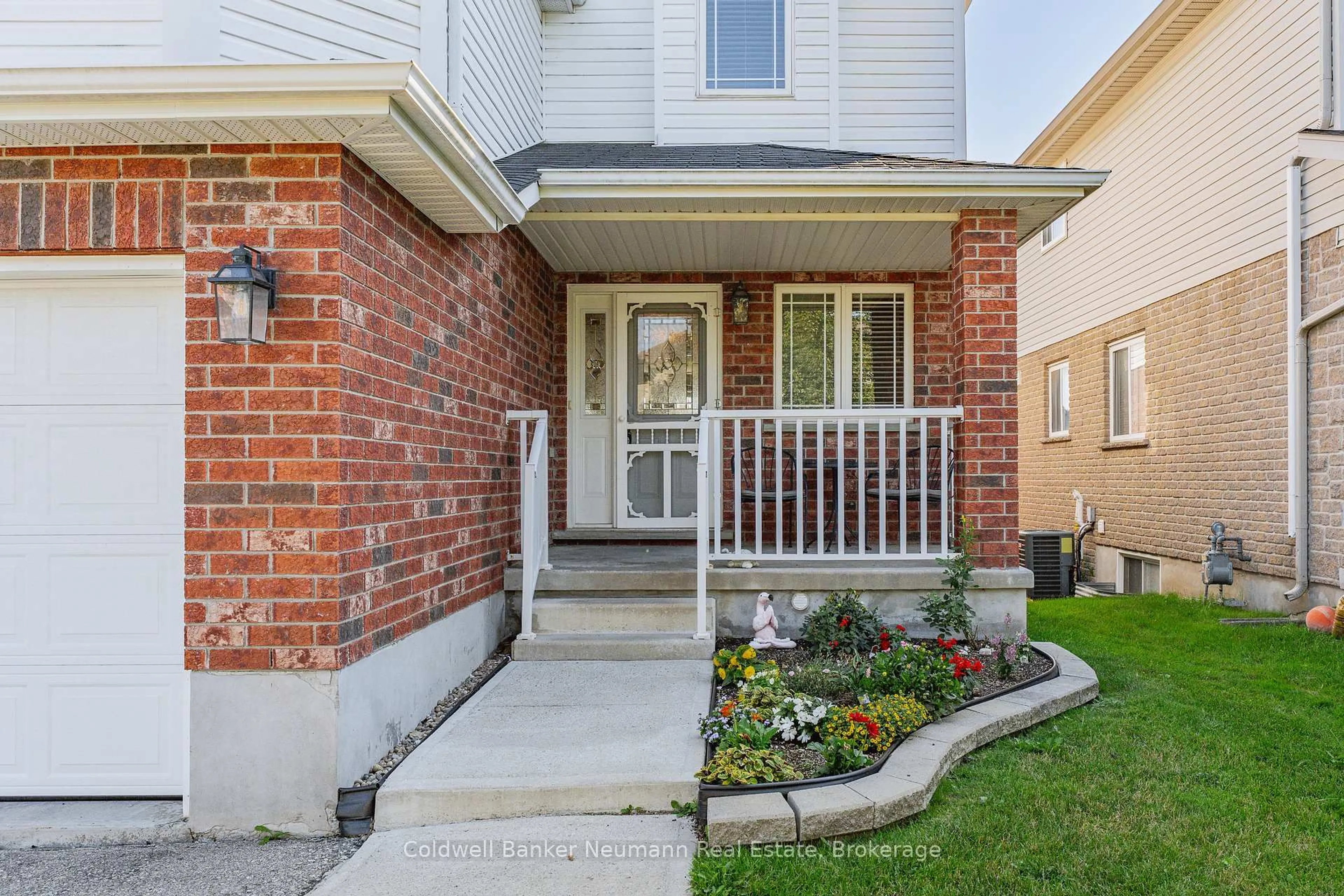 Home with brick exterior material, street for 58 Washburn Dr, Guelph Ontario N1E 0B2