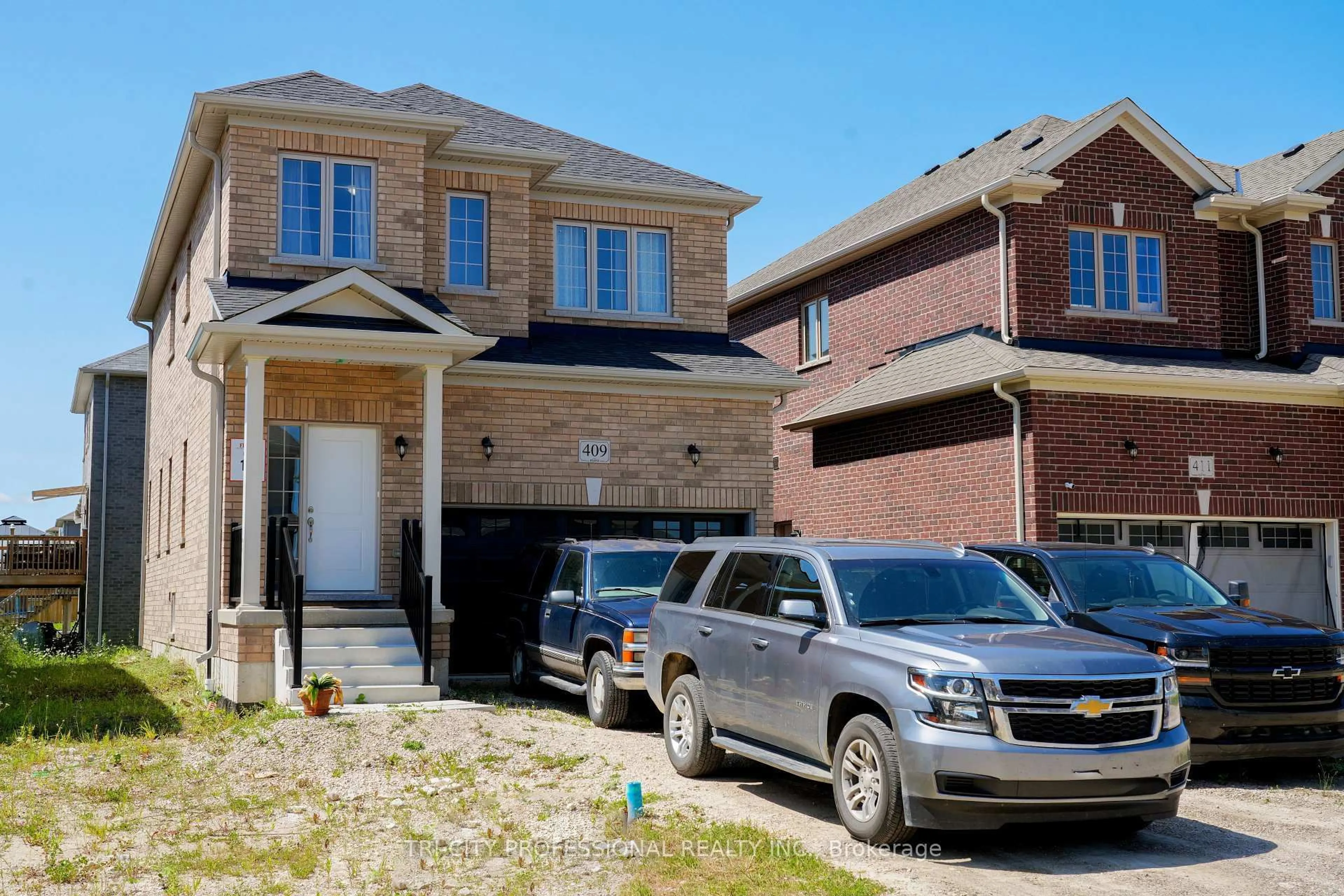 Home with brick exterior material, street for 409 Russell St, Southgate Ontario N0C 1B0