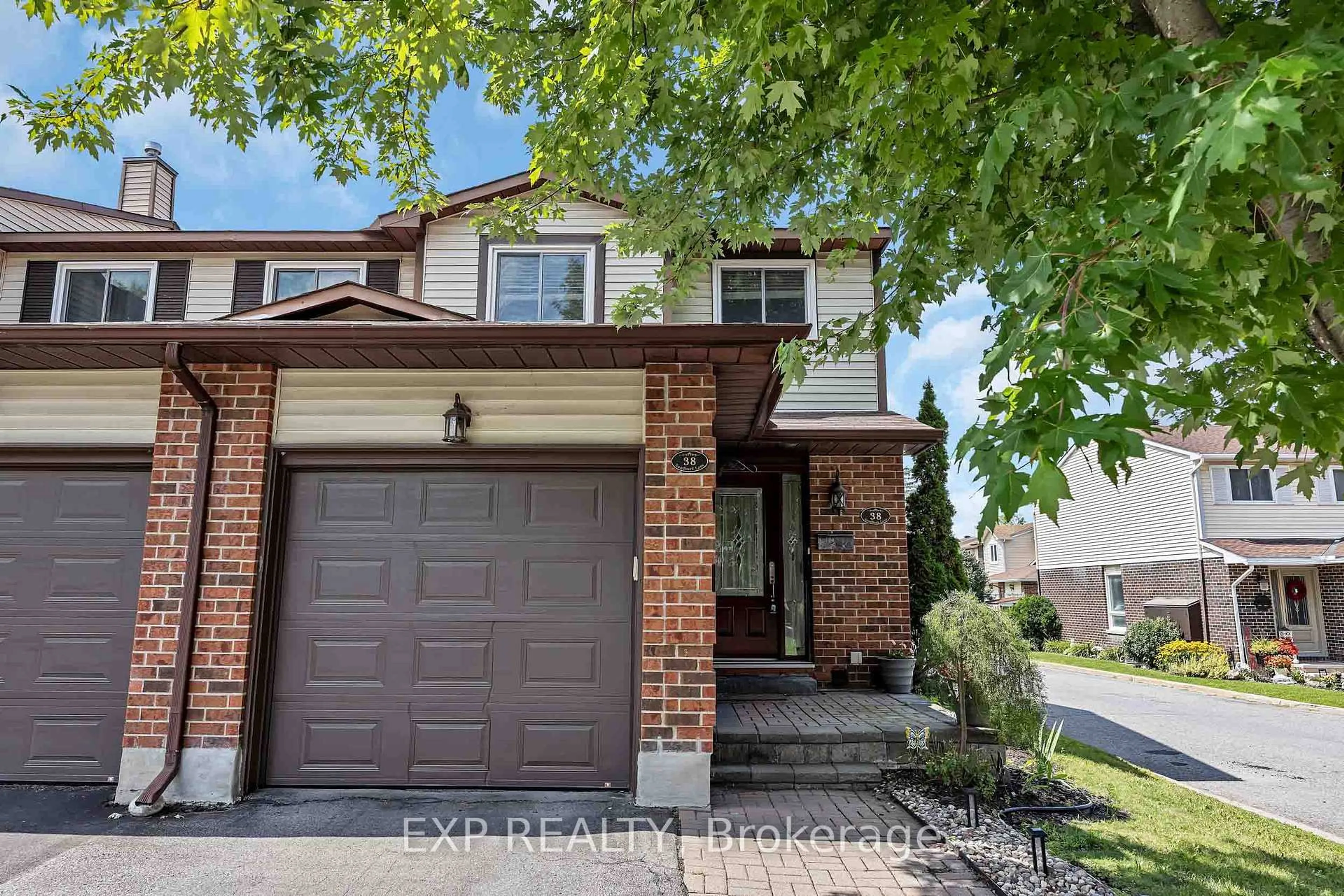 Home with brick exterior material, street for 38 Sundback Lane, Kanata Ontario K2L 2W8