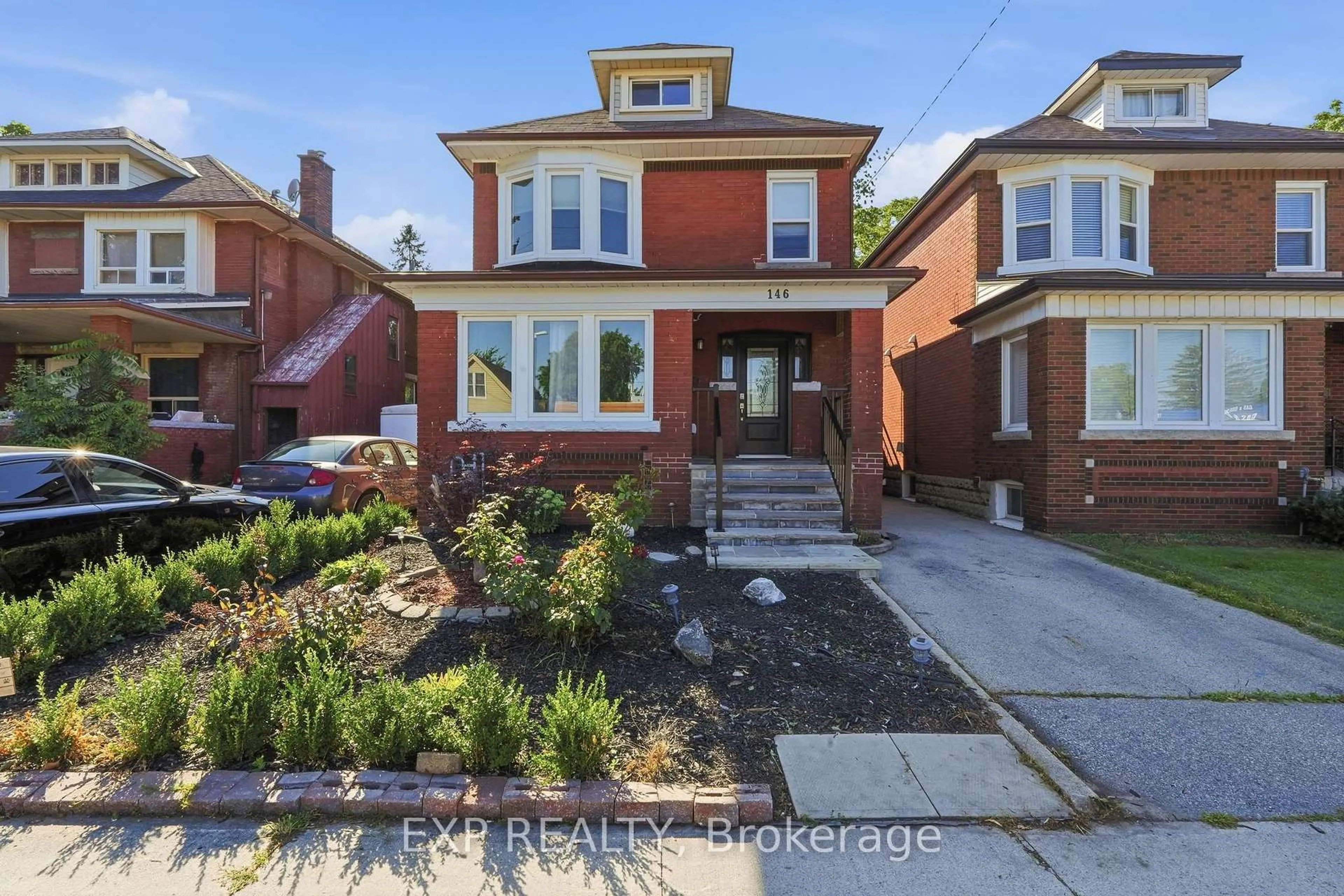 Home with brick exterior material, street for 146 Ottawa St, Hamilton Ontario L8K 2E4