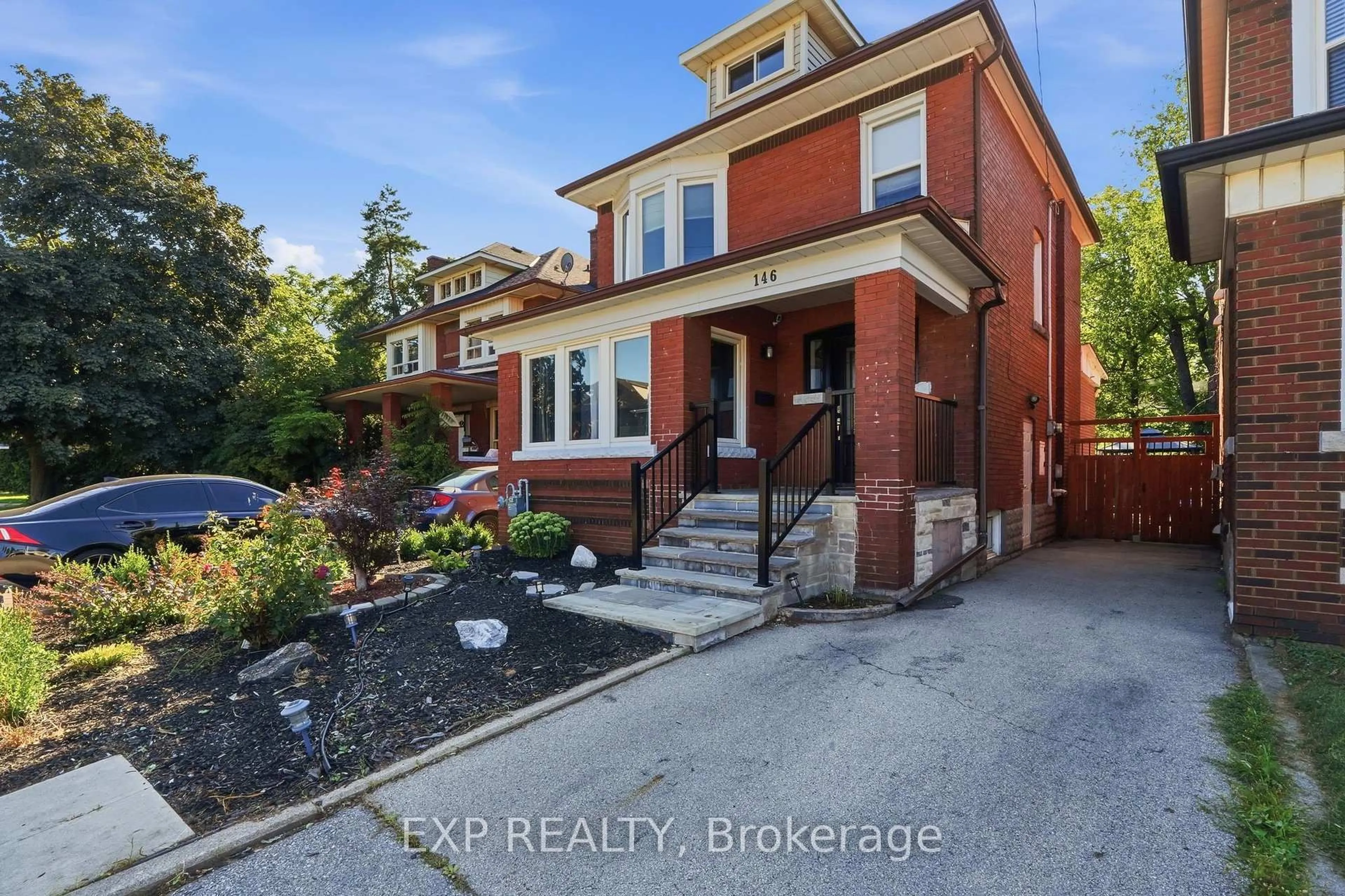 Home with brick exterior material, street for 146 Ottawa St, Hamilton Ontario L8K 2E4