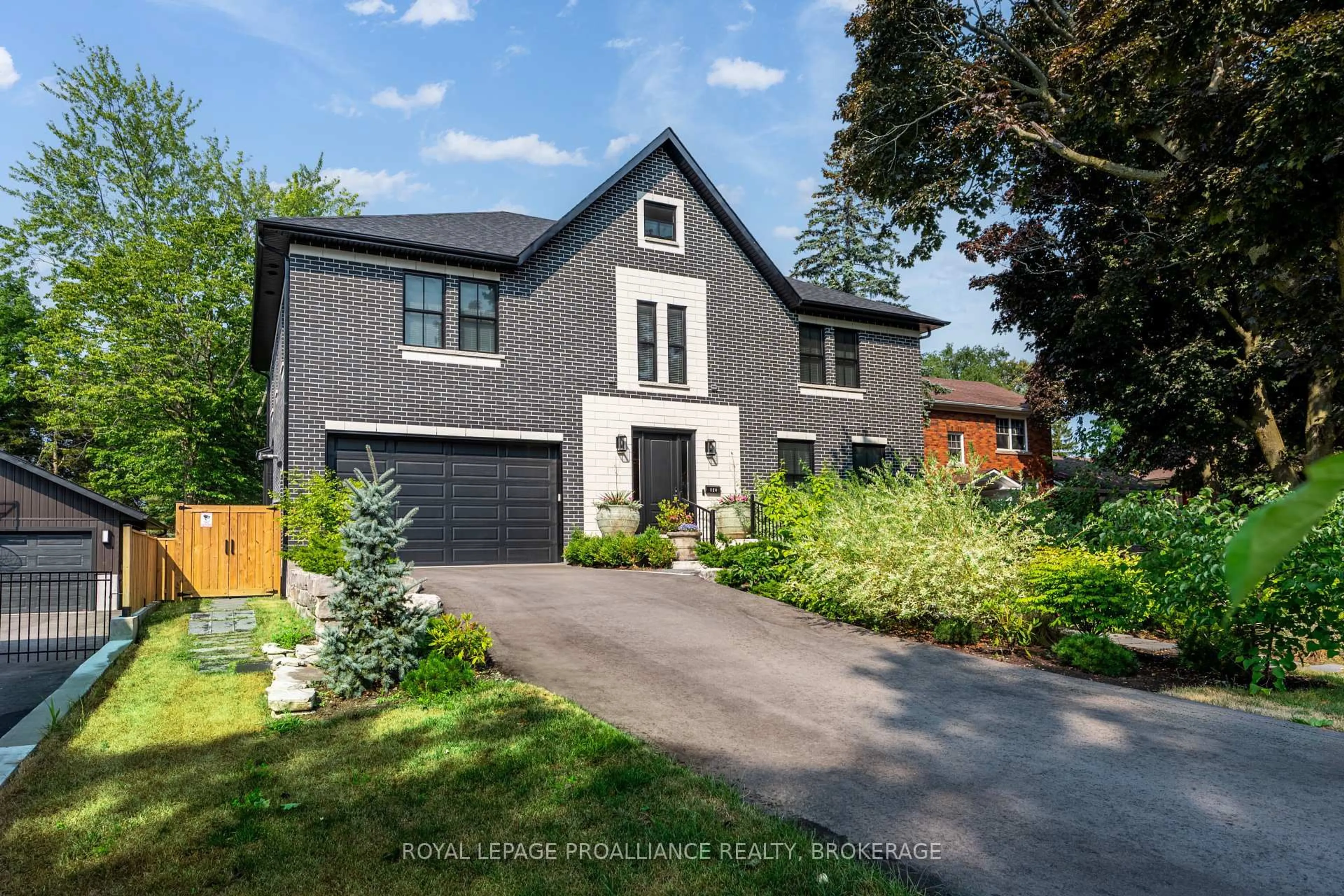 Home with brick exterior material, street for 124 Churchill Cres, Kingston Ontario K7L 4N2