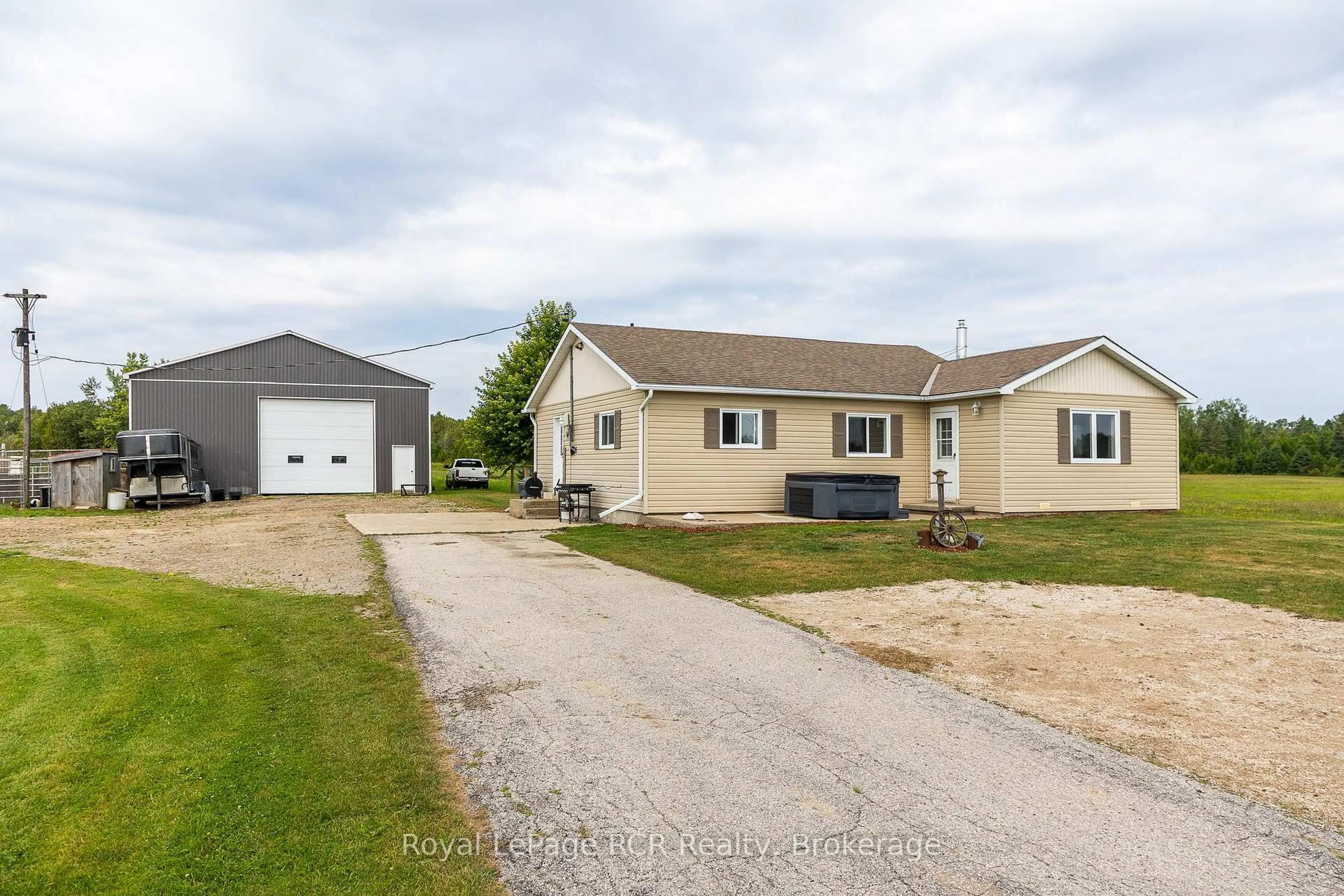 A pic from outside/outdoor area/front of a property/back of a property/a pic from drone, street for 1519 West Rd, Northern Bruce Peninsula Ontario N0H 1W0