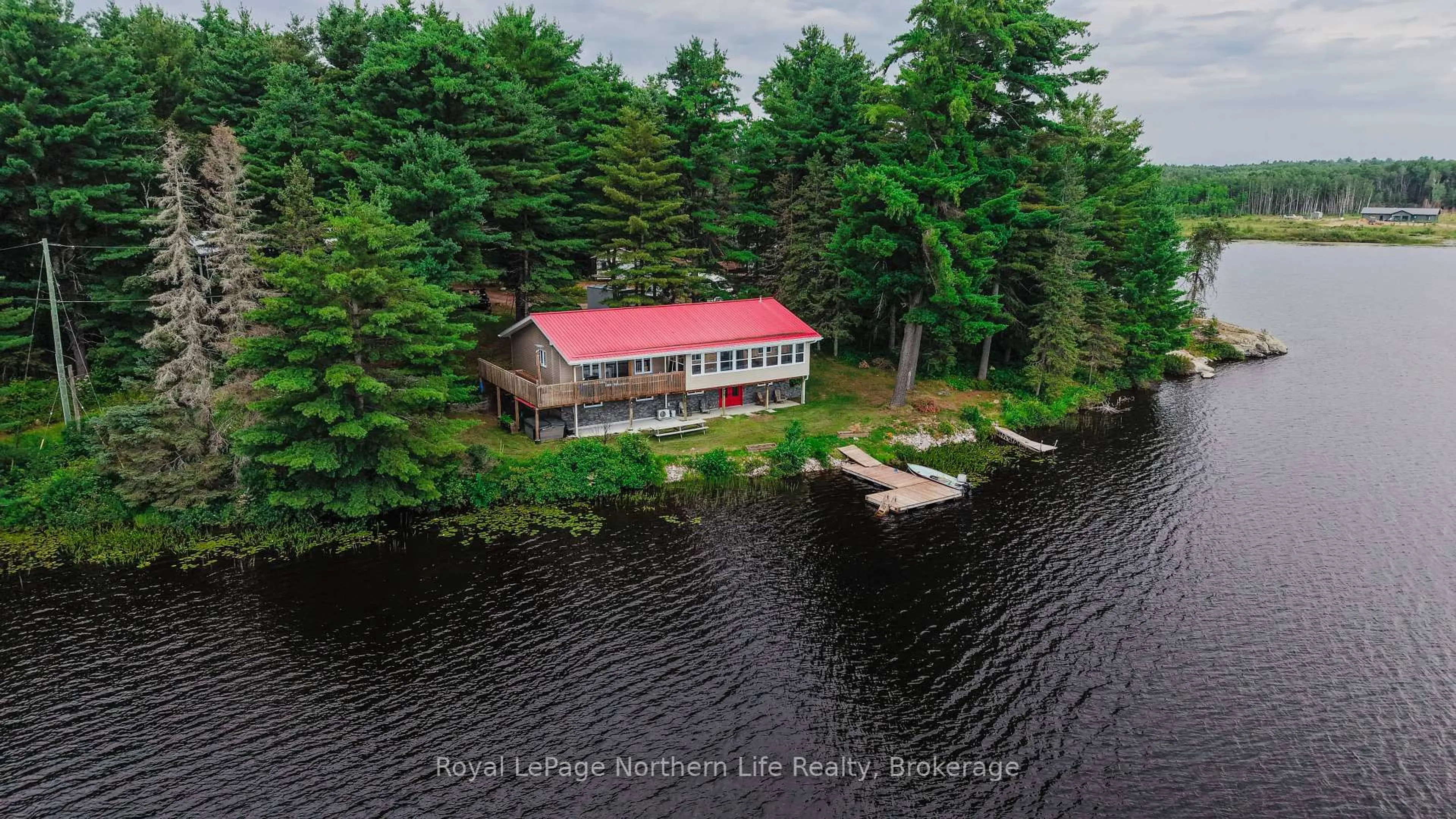 A pic from outside/outdoor area/front of a property/back of a property/a pic from drone, water/lake/river/ocean view for 33 G Lac Cache Rd, West Nipissing Ontario P0H 2M0