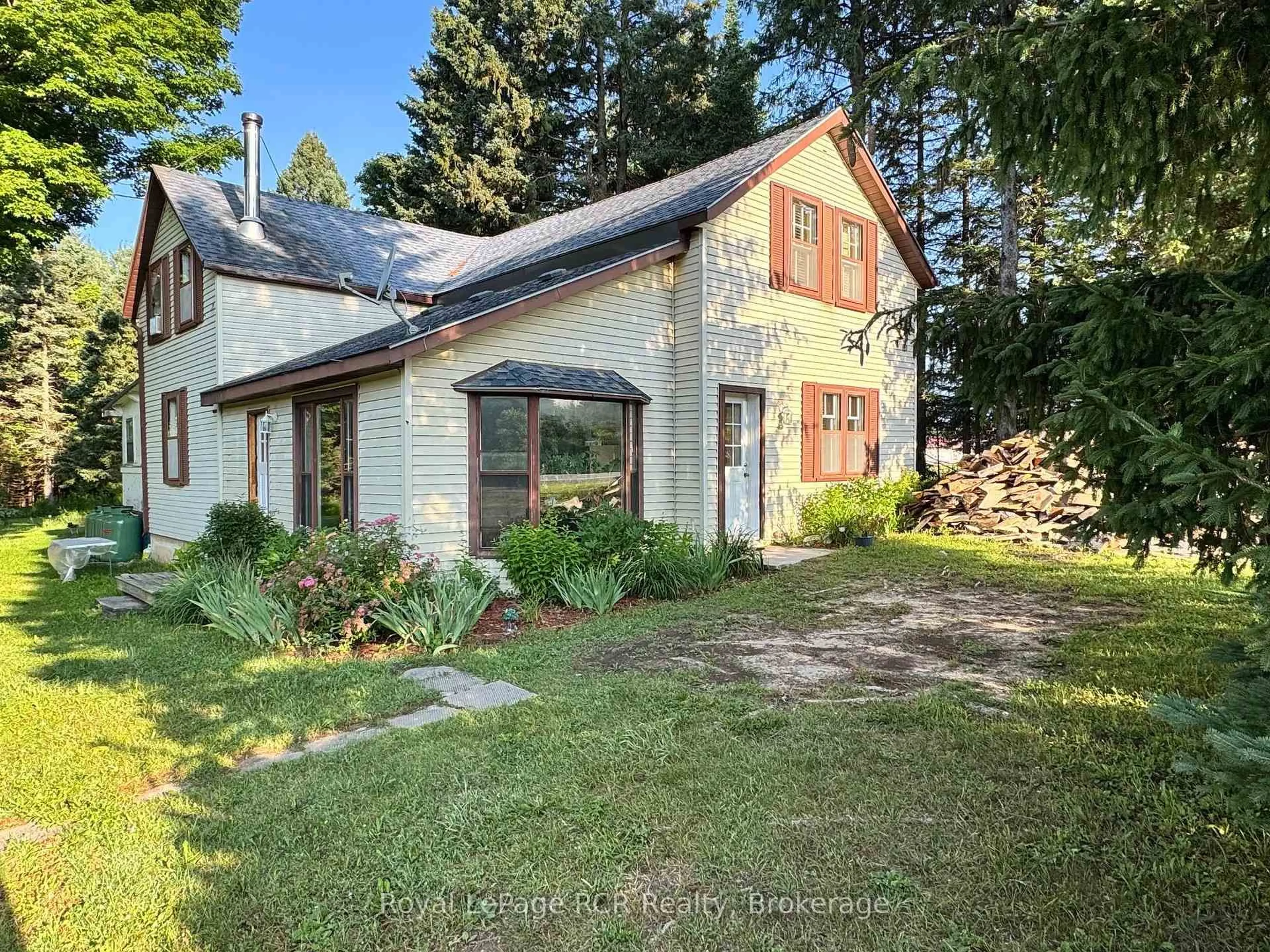 A pic from outside/outdoor area/front of a property/back of a property/a pic from drone, street for 315134 Highway 6, West Grey Ontario N0G 1R0