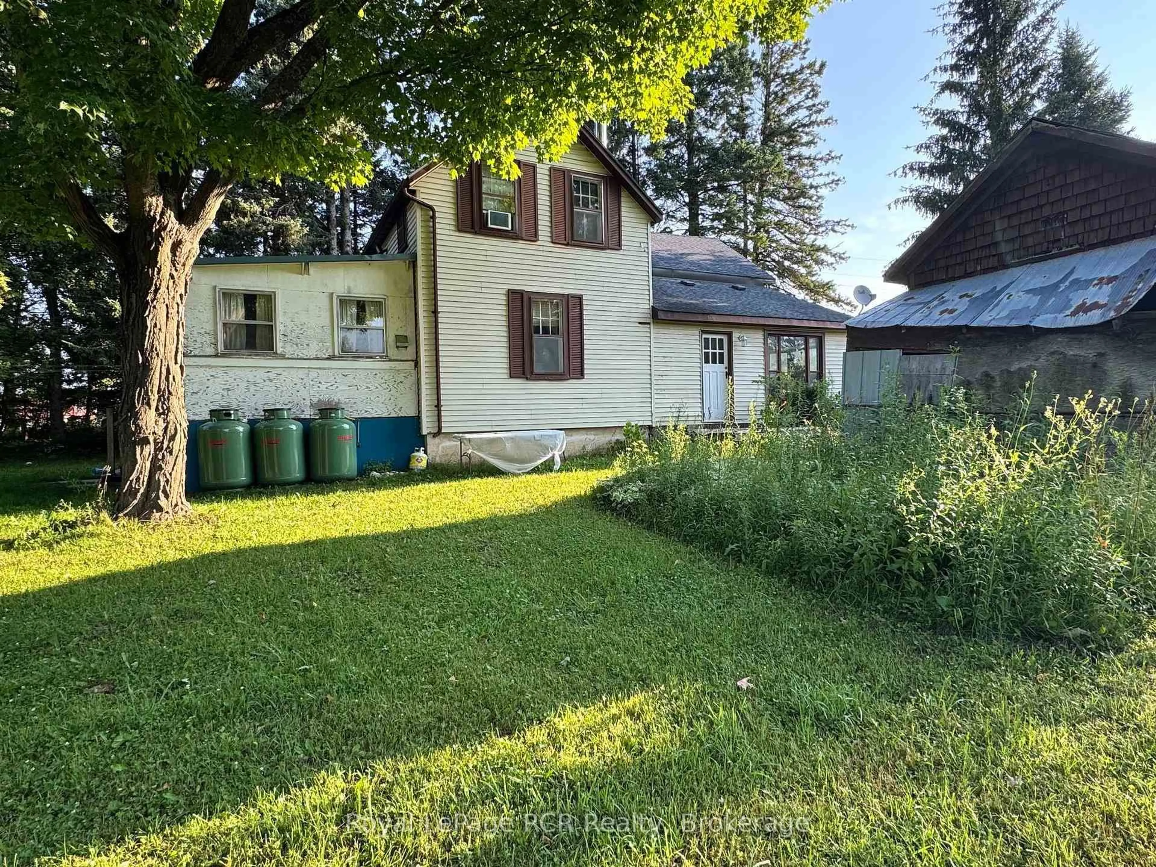 A pic from outside/outdoor area/front of a property/back of a property/a pic from drone, street for 315134 Highway 6, West Grey Ontario N0G 1R0