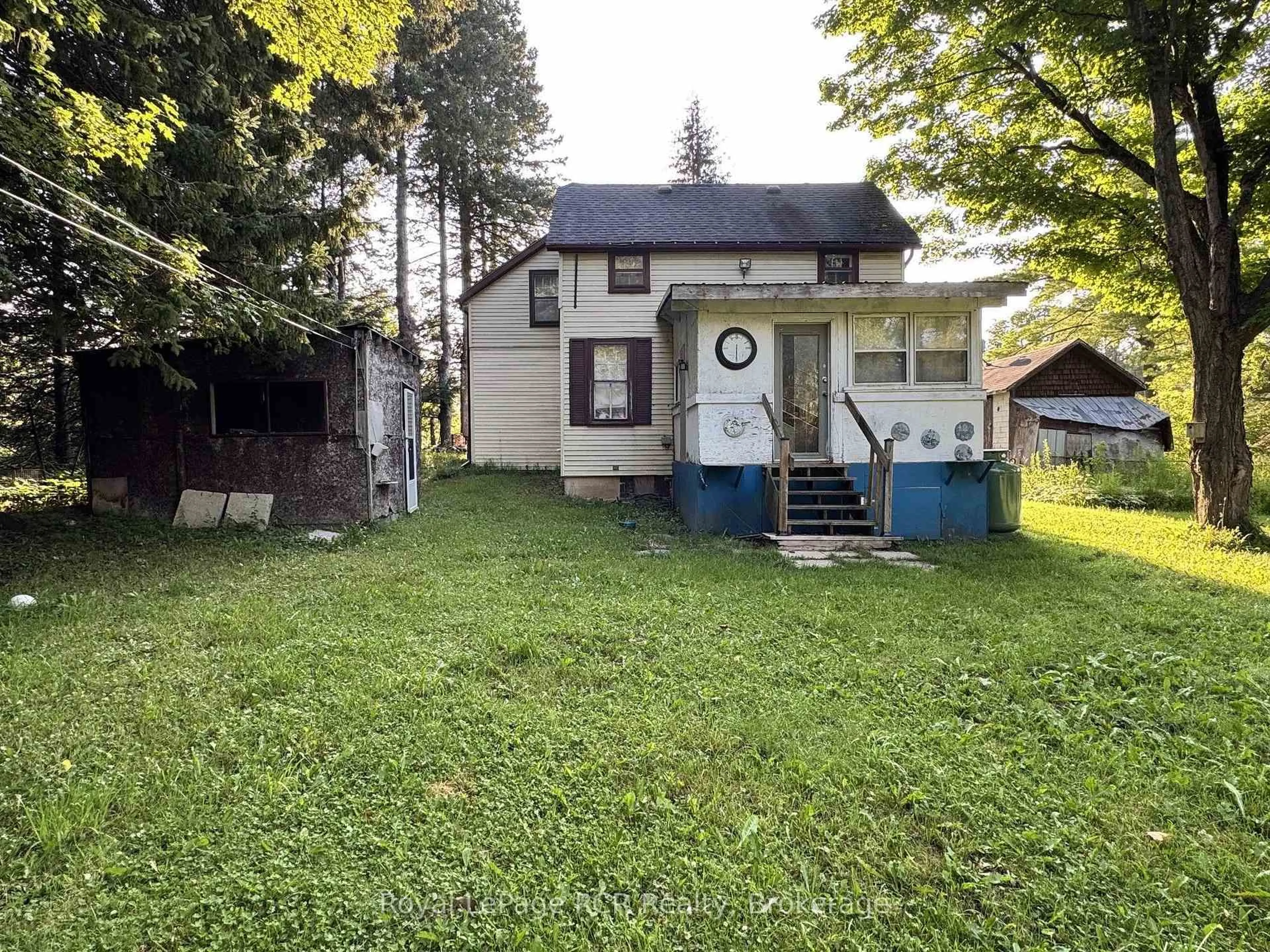 A pic from outside/outdoor area/front of a property/back of a property/a pic from drone, street for 315134 Highway 6, West Grey Ontario N0G 1R0