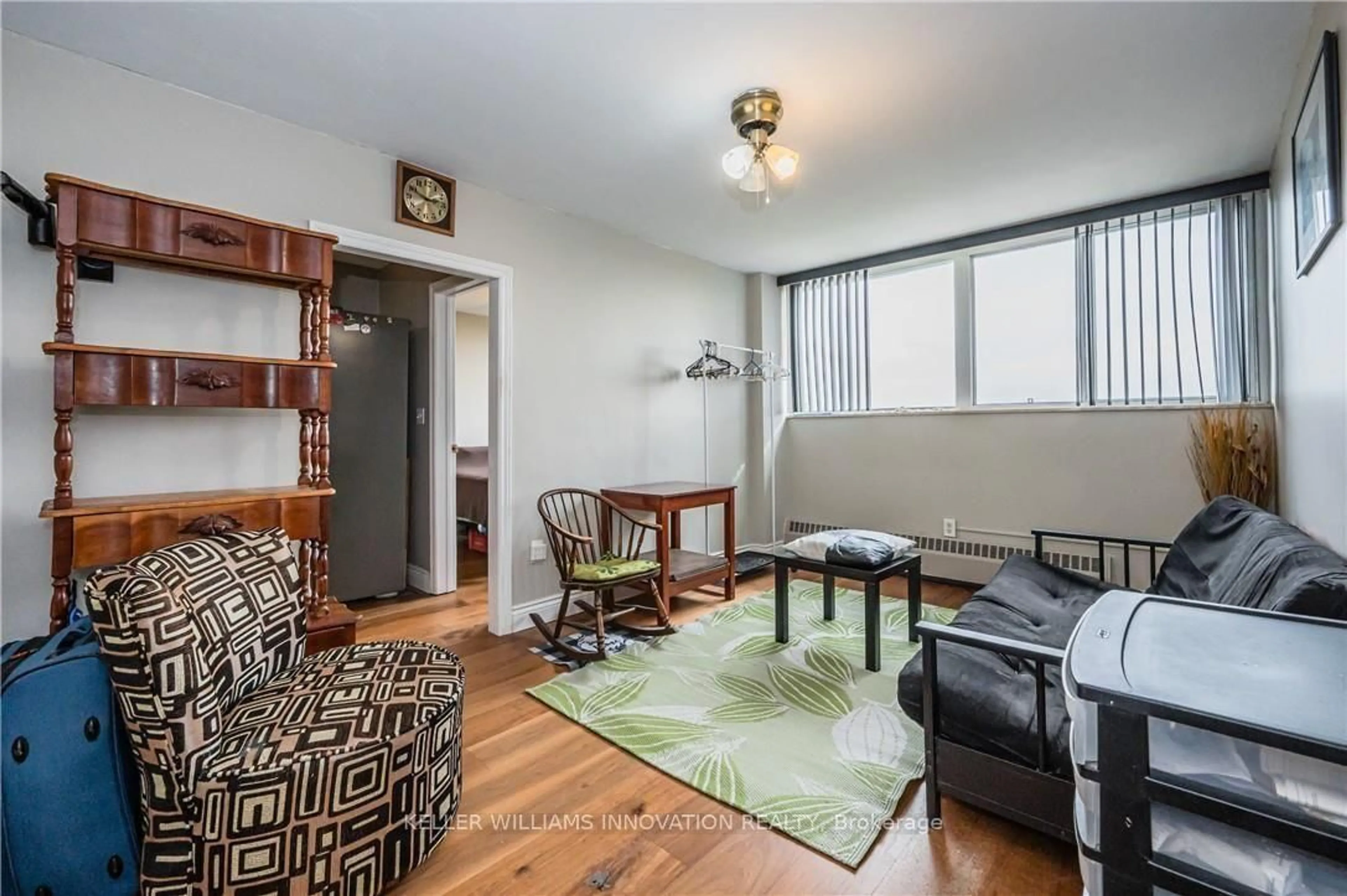 Living room with furniture, wood/laminate floor for 24 Midland Dr, Kitchener Ontario N2A 2A8