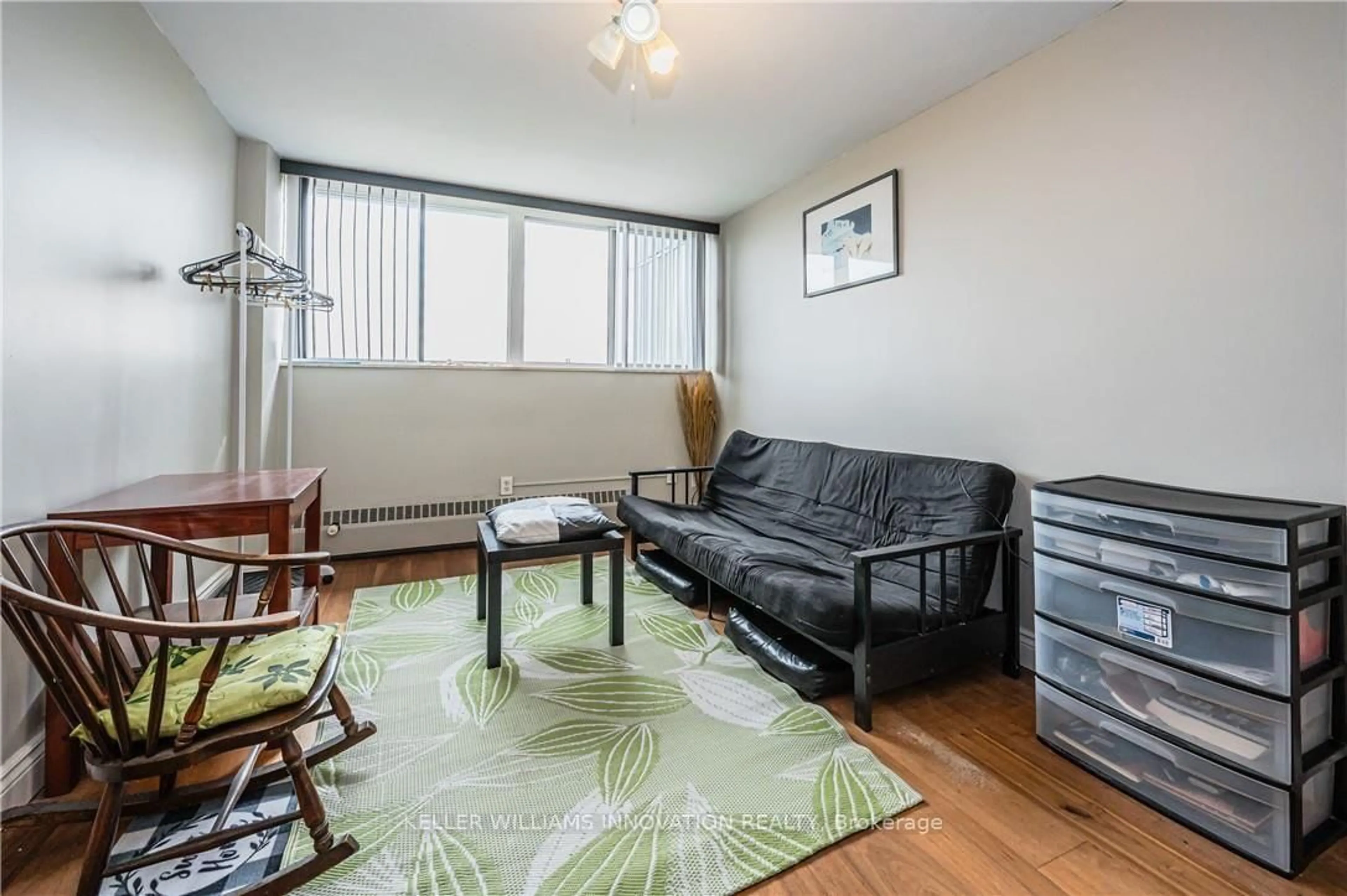 Living room with furniture, wood/laminate floor for 24 Midland Dr, Kitchener Ontario N2A 2A8