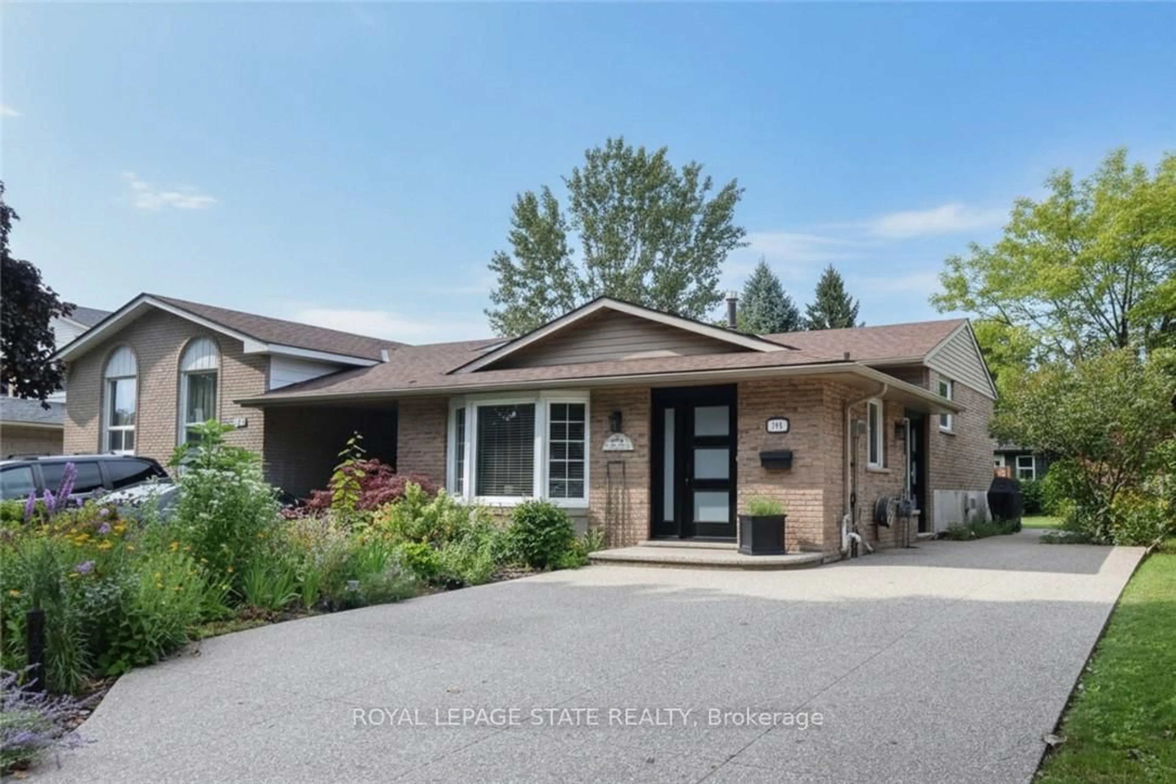 Home with brick exterior material, street for 374 Brigadoon Dr, Hamilton Ontario L9C 6X4