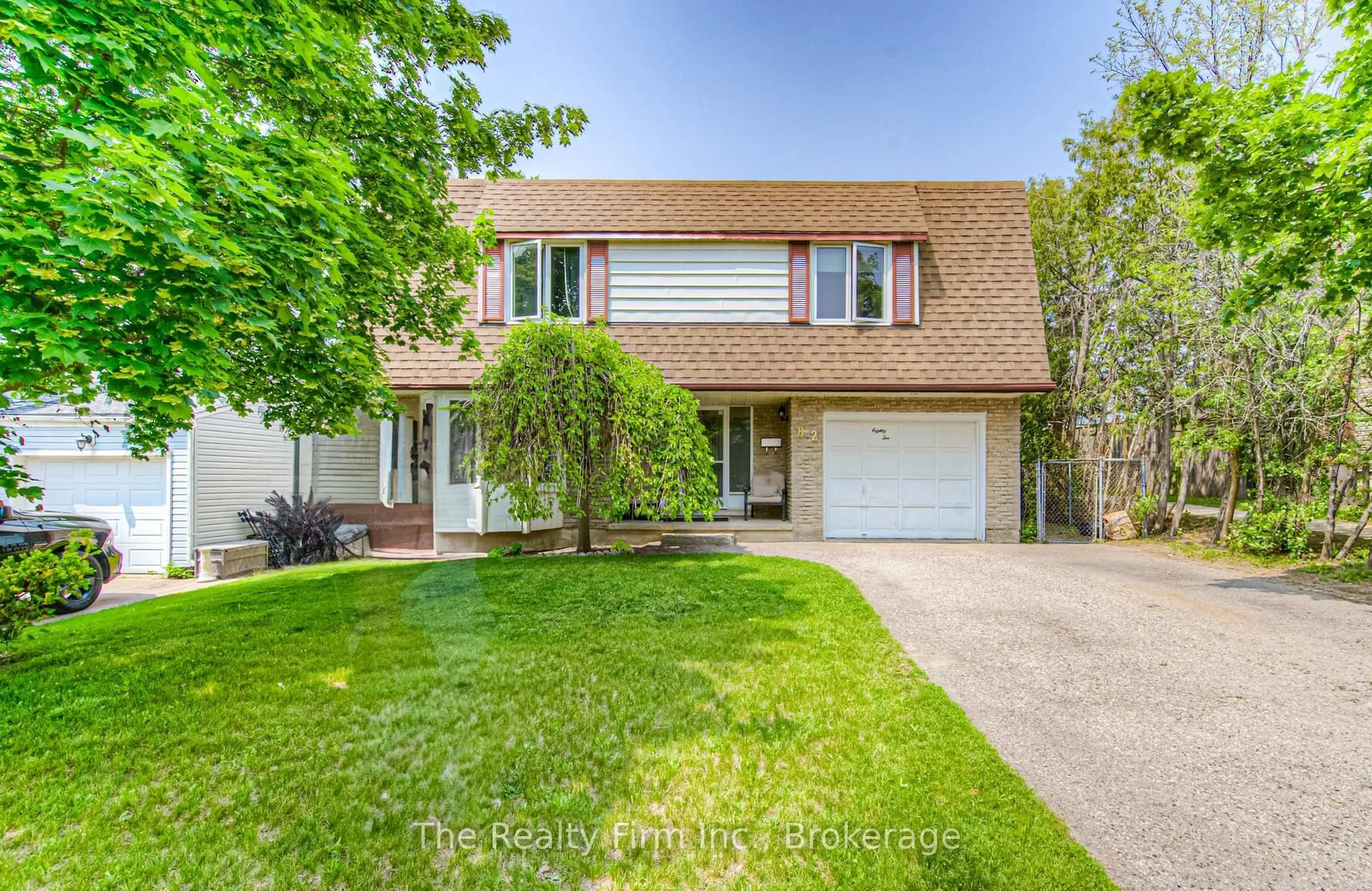 Home with vinyl exterior material, street for 82 Roseneath Cres, Kitchener Ontario N2E 1V9