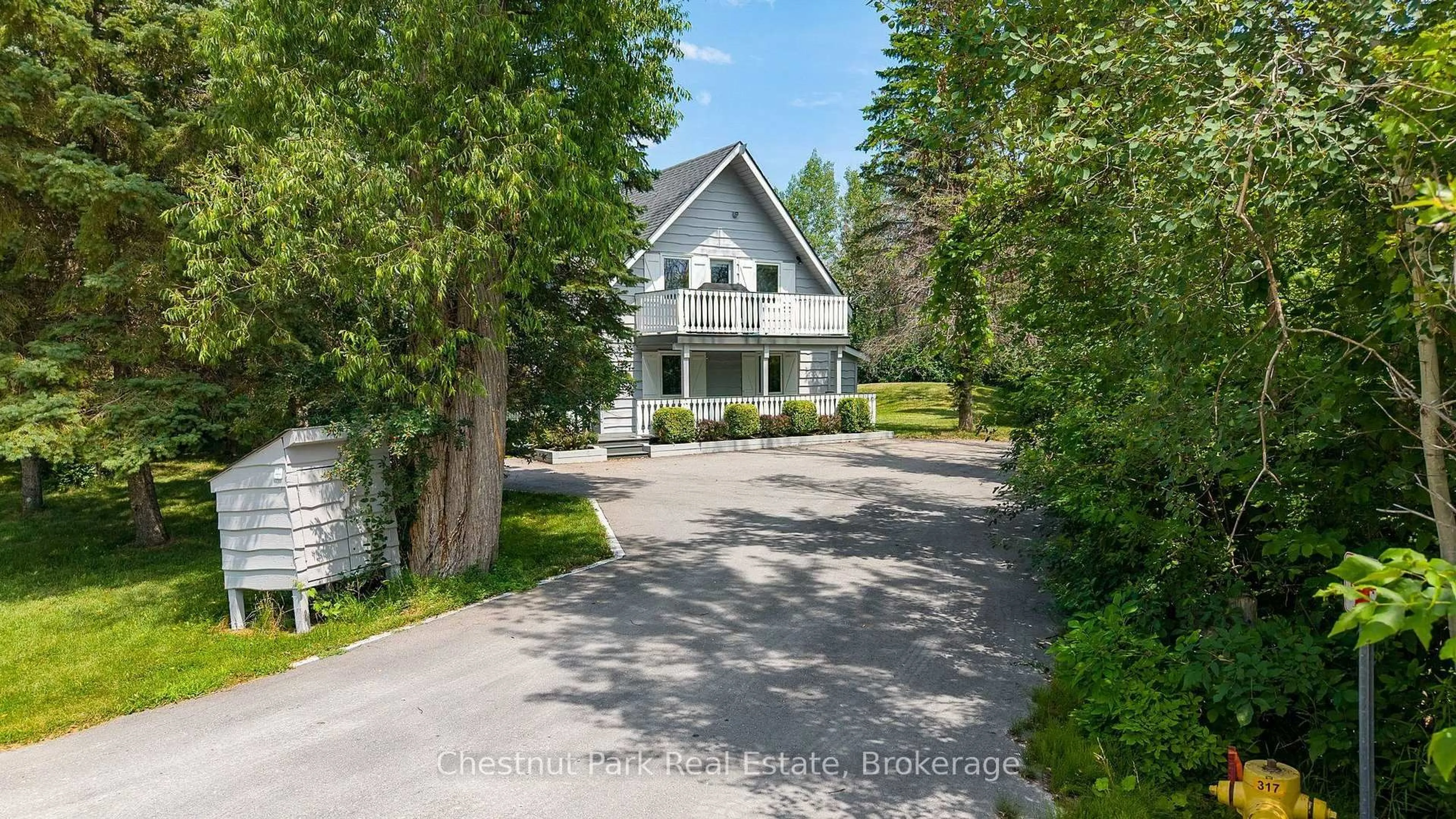 A pic from outside/outdoor area/front of a property/back of a property/a pic from drone, street for 131 Martin Grve, Blue Mountains Ontario L9Y 0N5